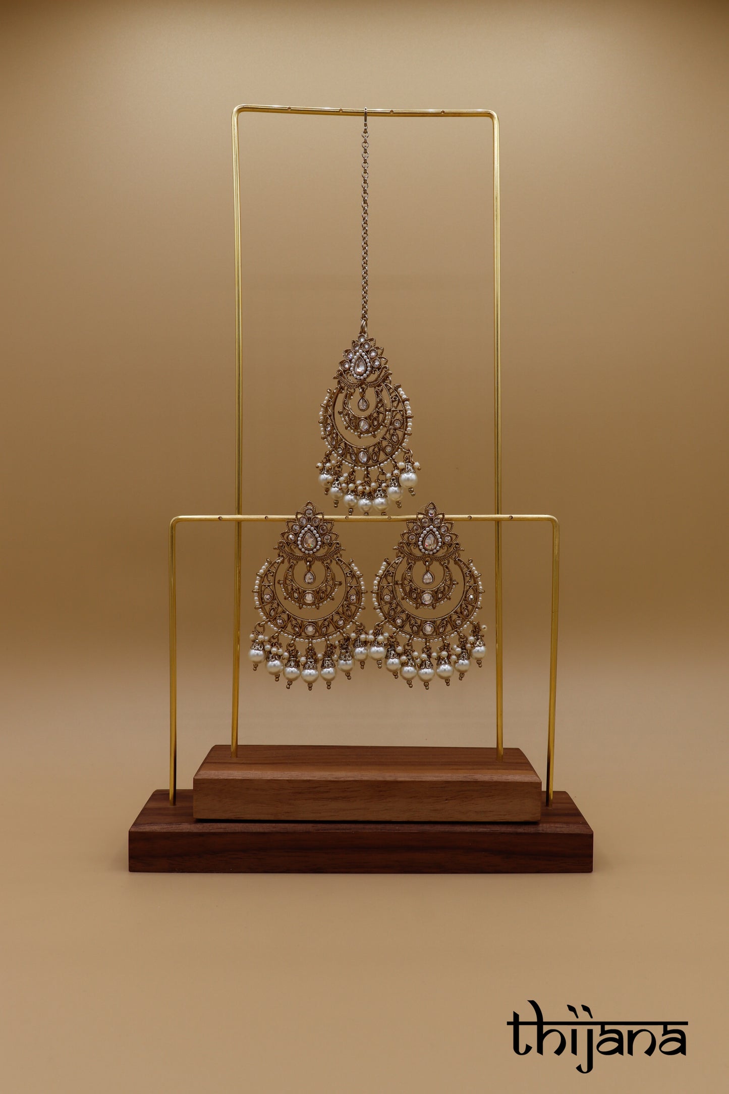 Earrings with matching tikka