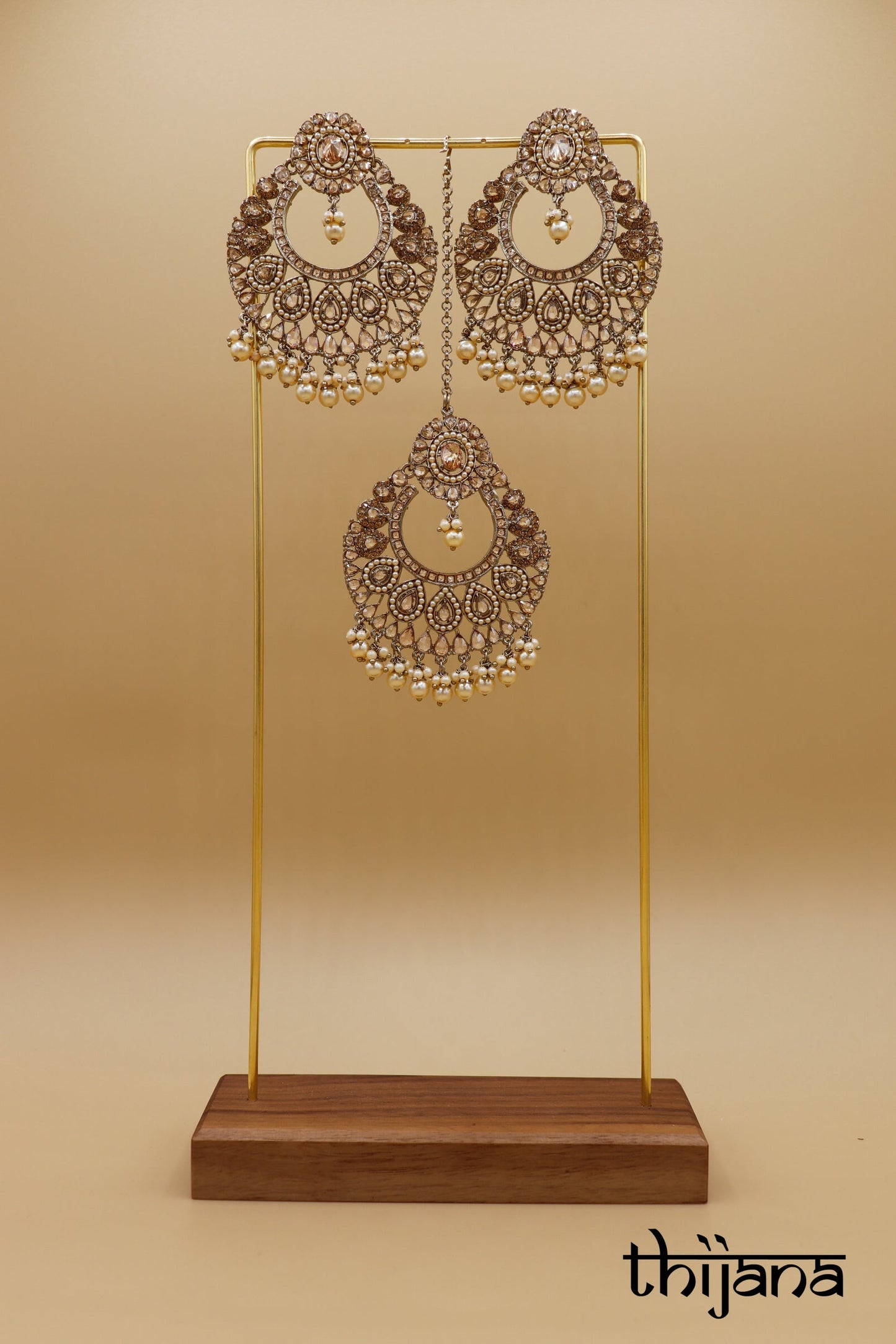 Earrings with matching tikka