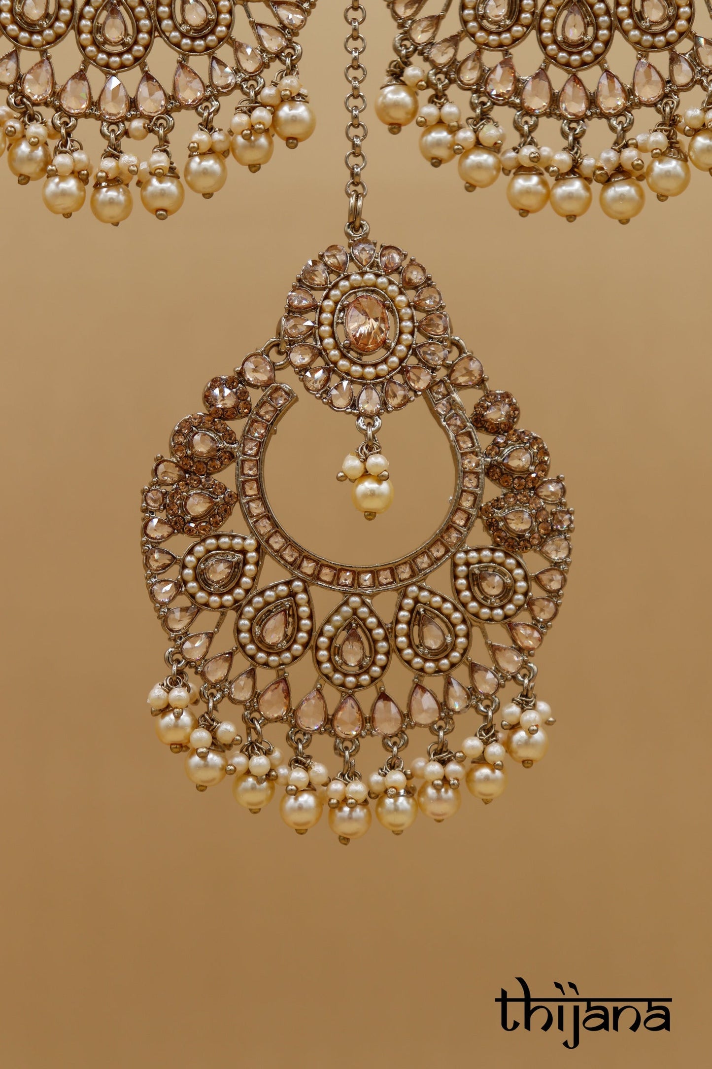 Earrings with matching tikka