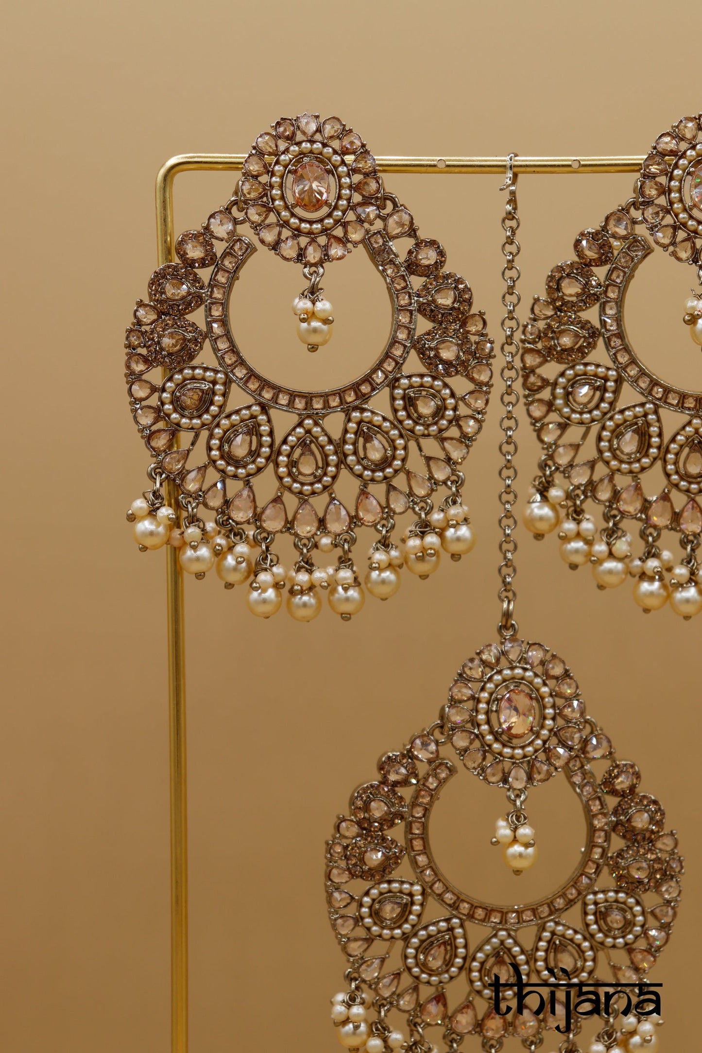 Earrings with matching tikka
