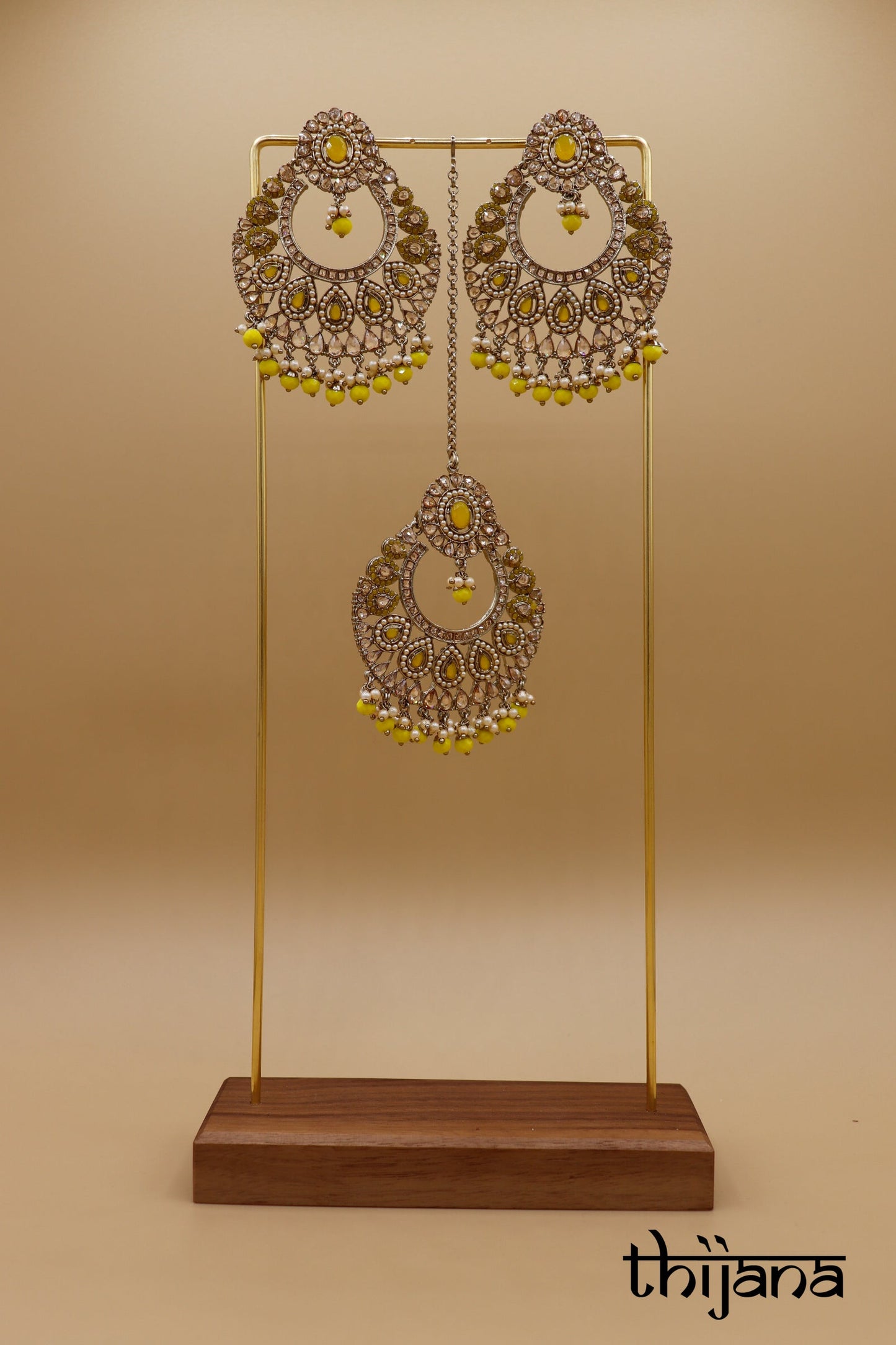 Earrings with matching tikka