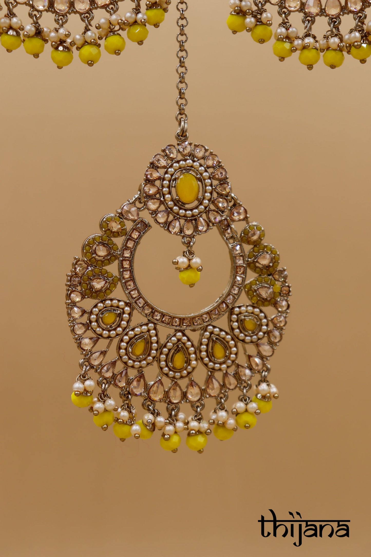 Earrings with matching tikka