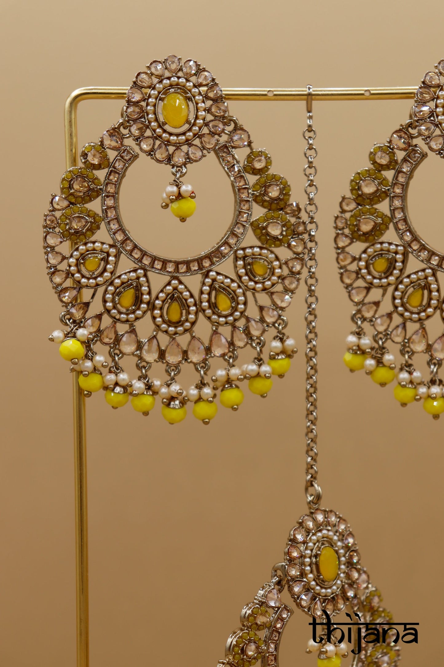 Earrings with matching tikka