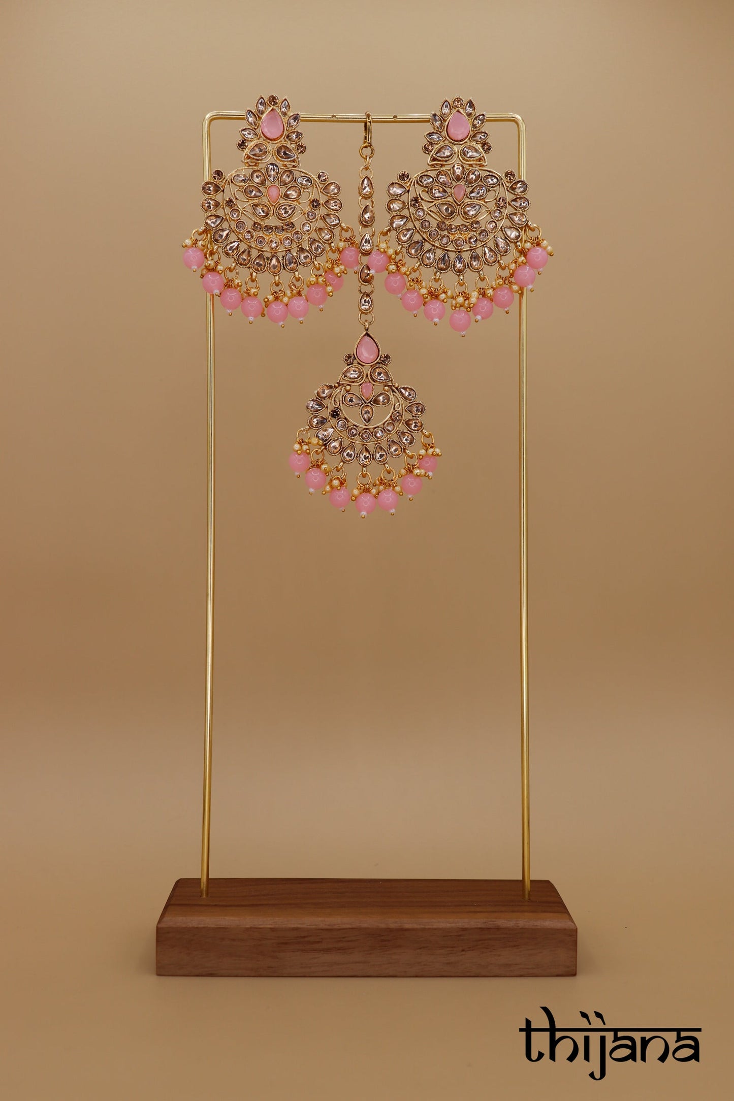 Earrings with matching tikka
