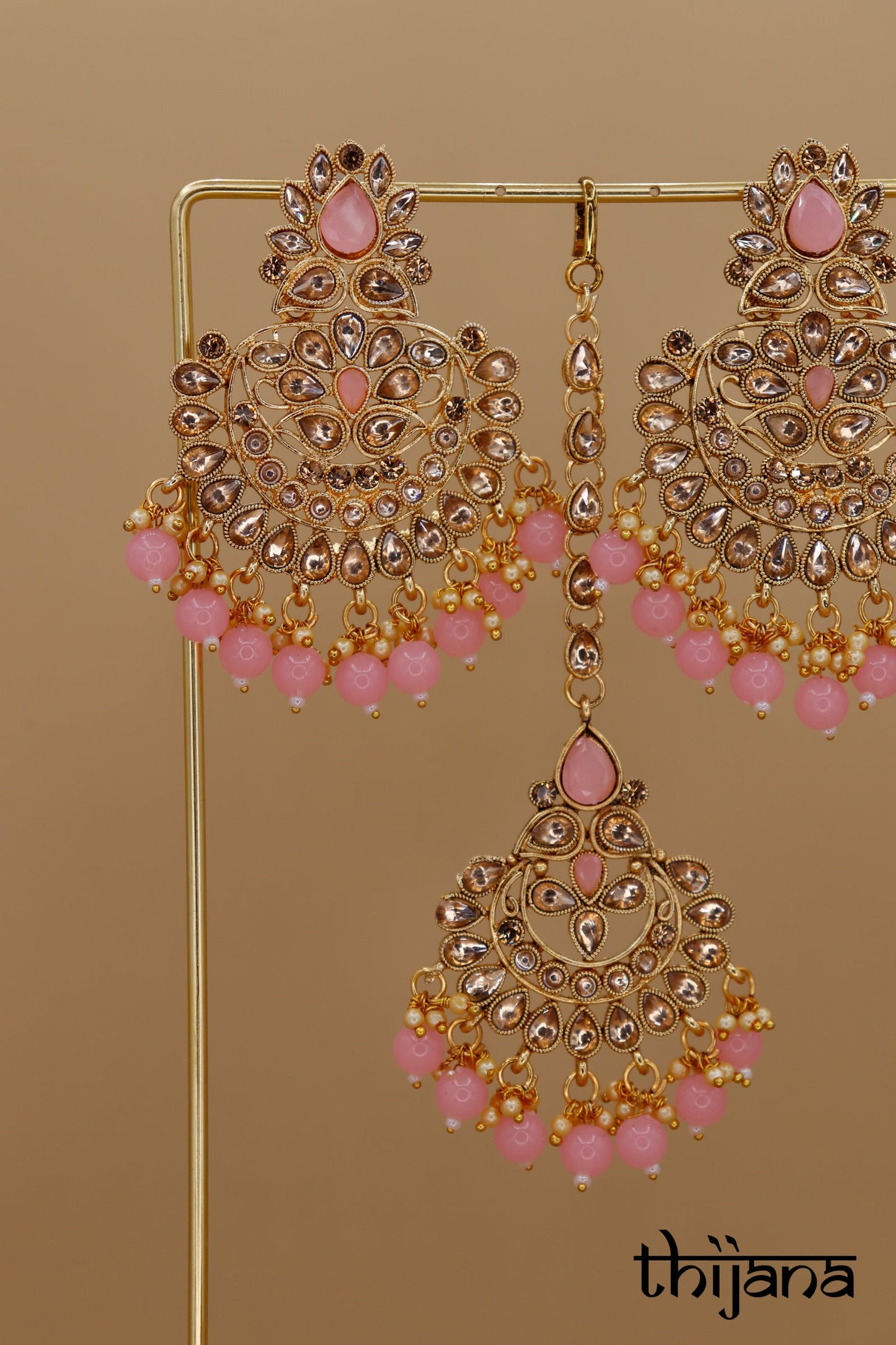 Earrings with matching tikka