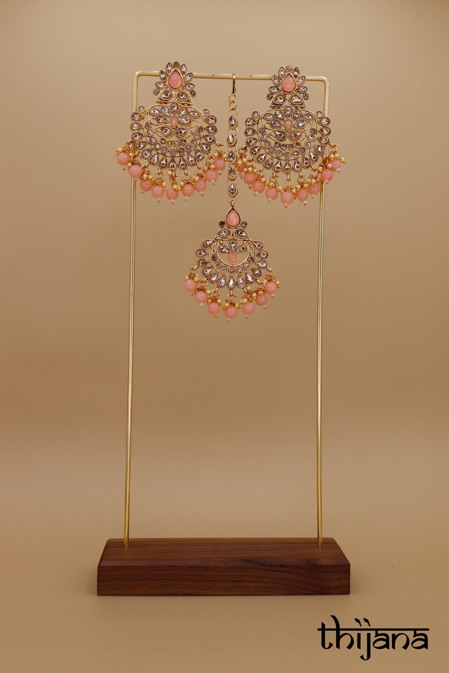 Earrings with matching tikka