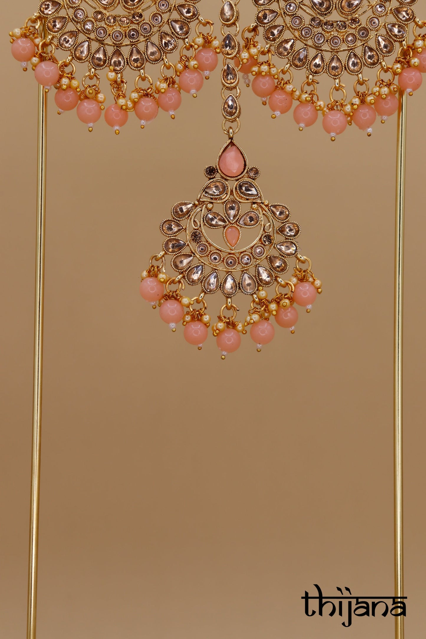 Earrings with matching tikka