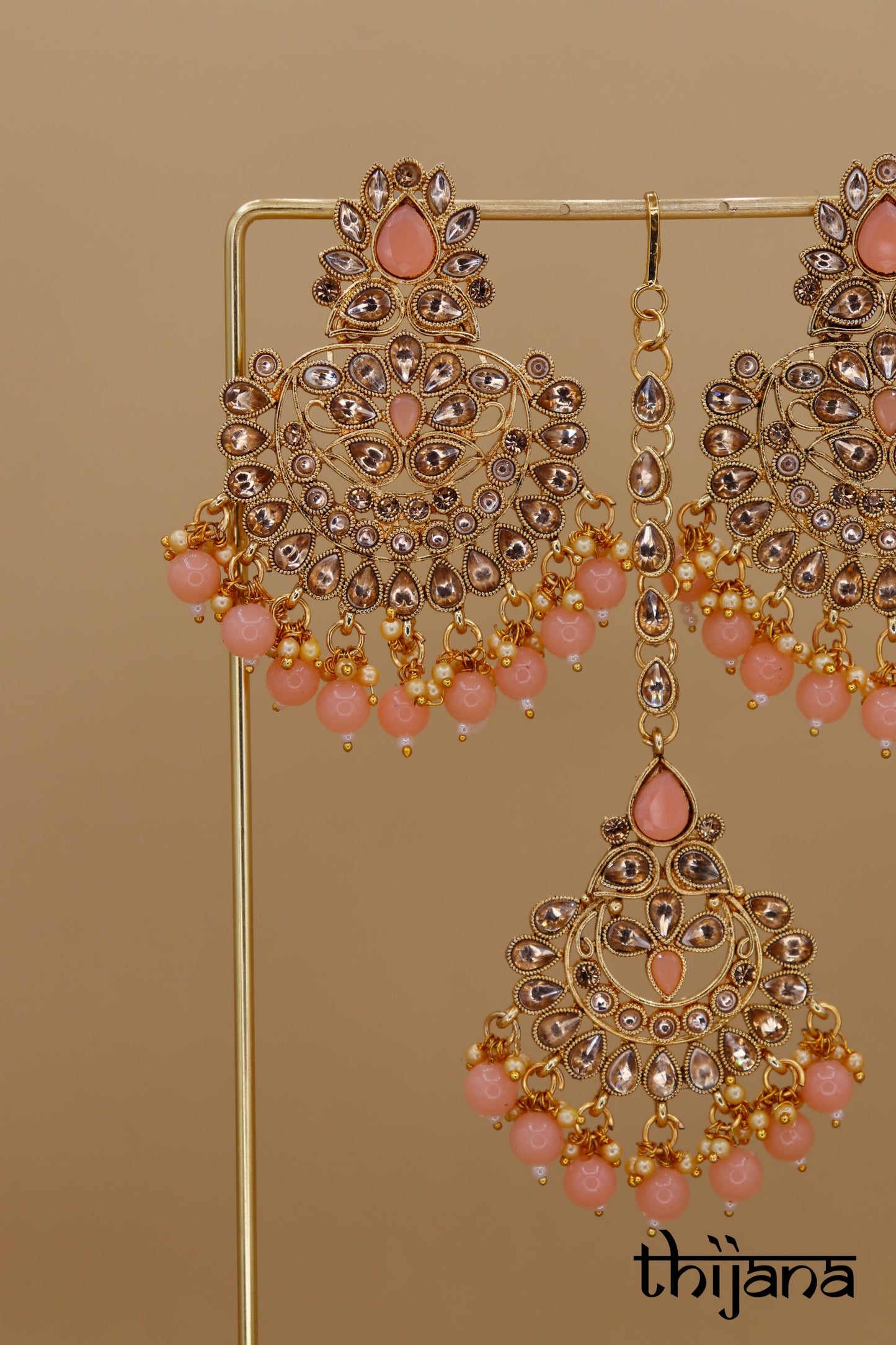 Earrings with matching tikka