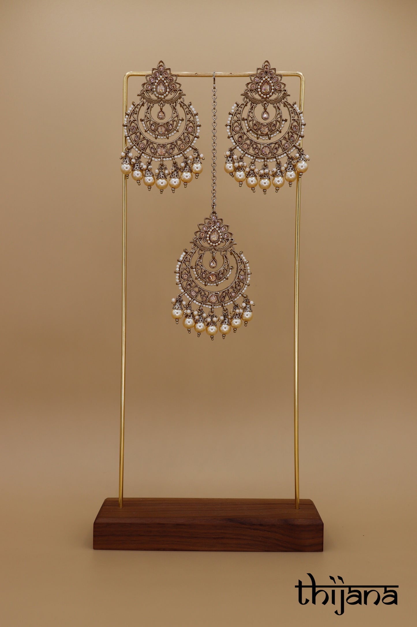 Earrings with matching tikka