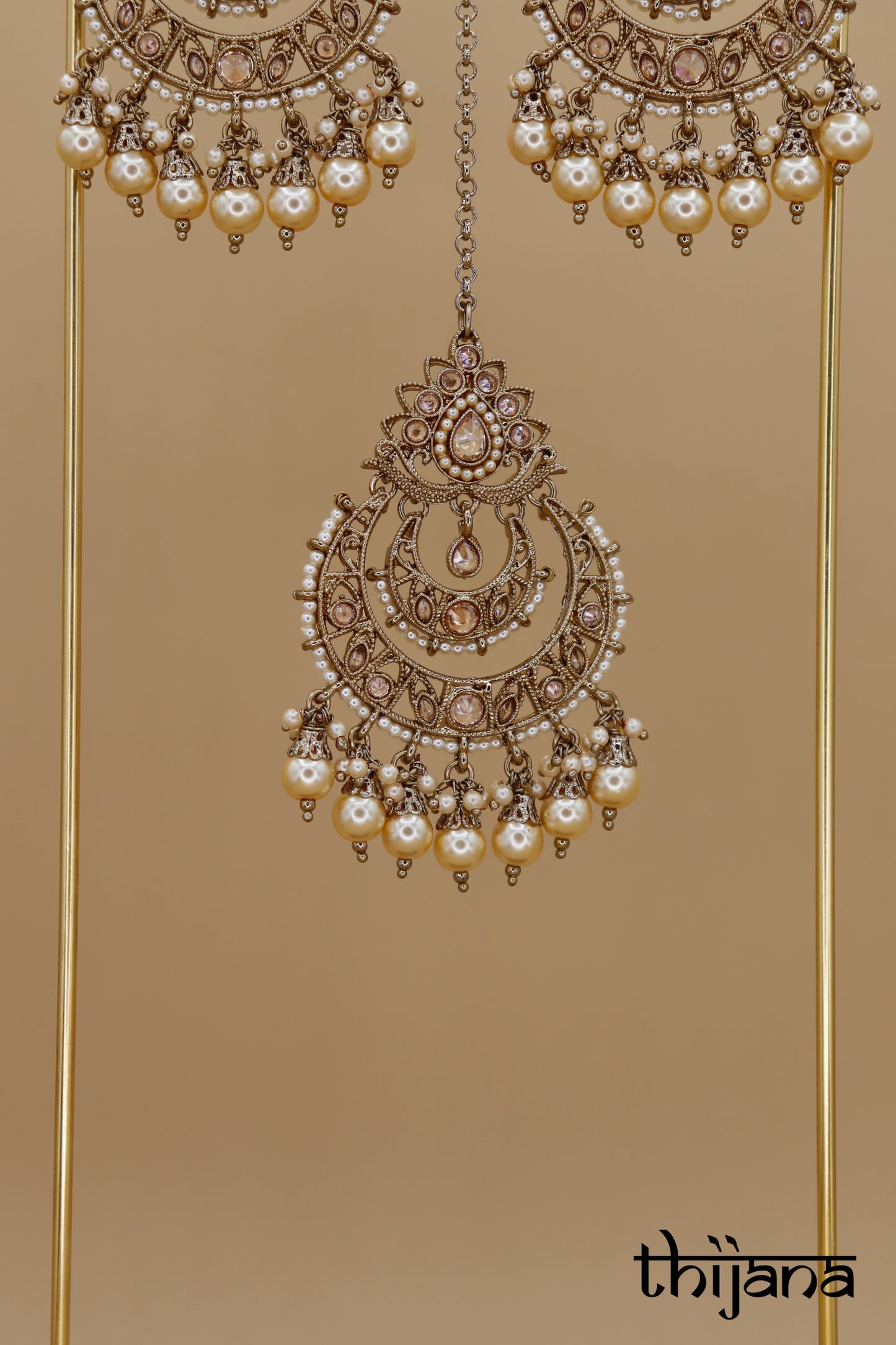 Earrings with matching tikka