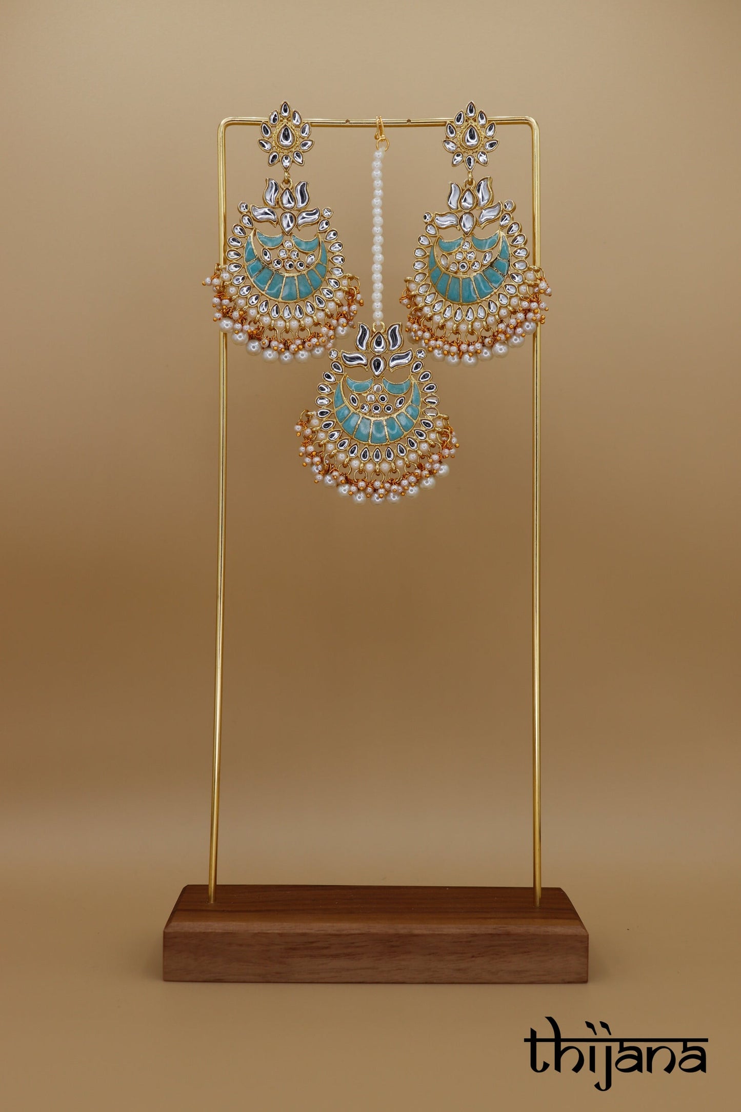 Earrings with matching tikka