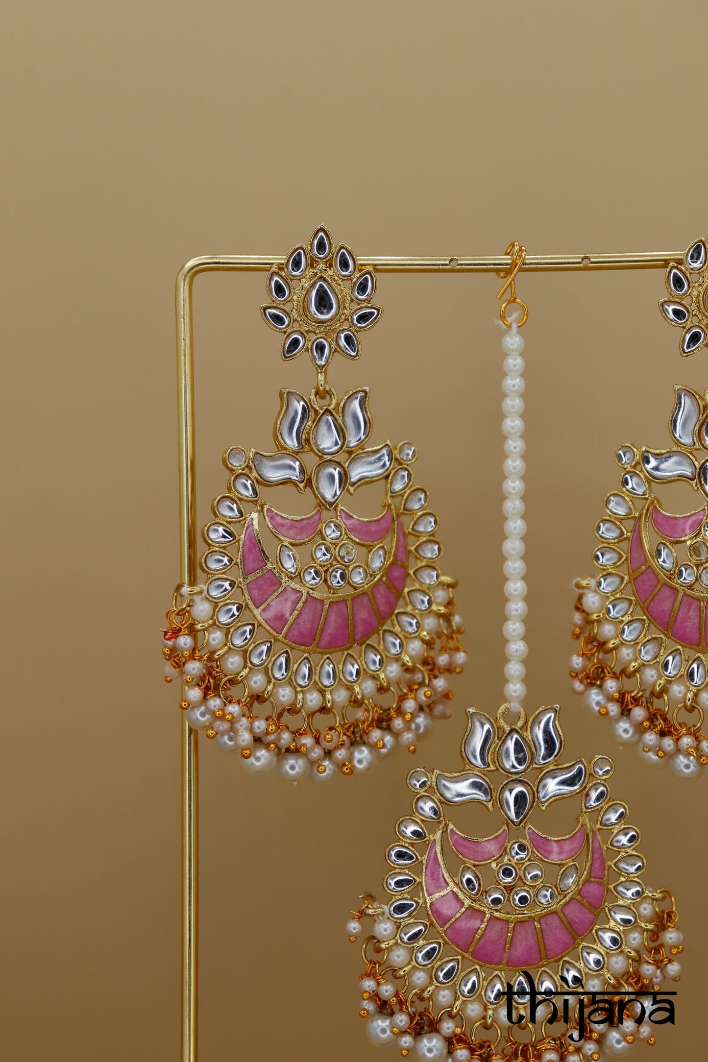 Earrings with matching tikka