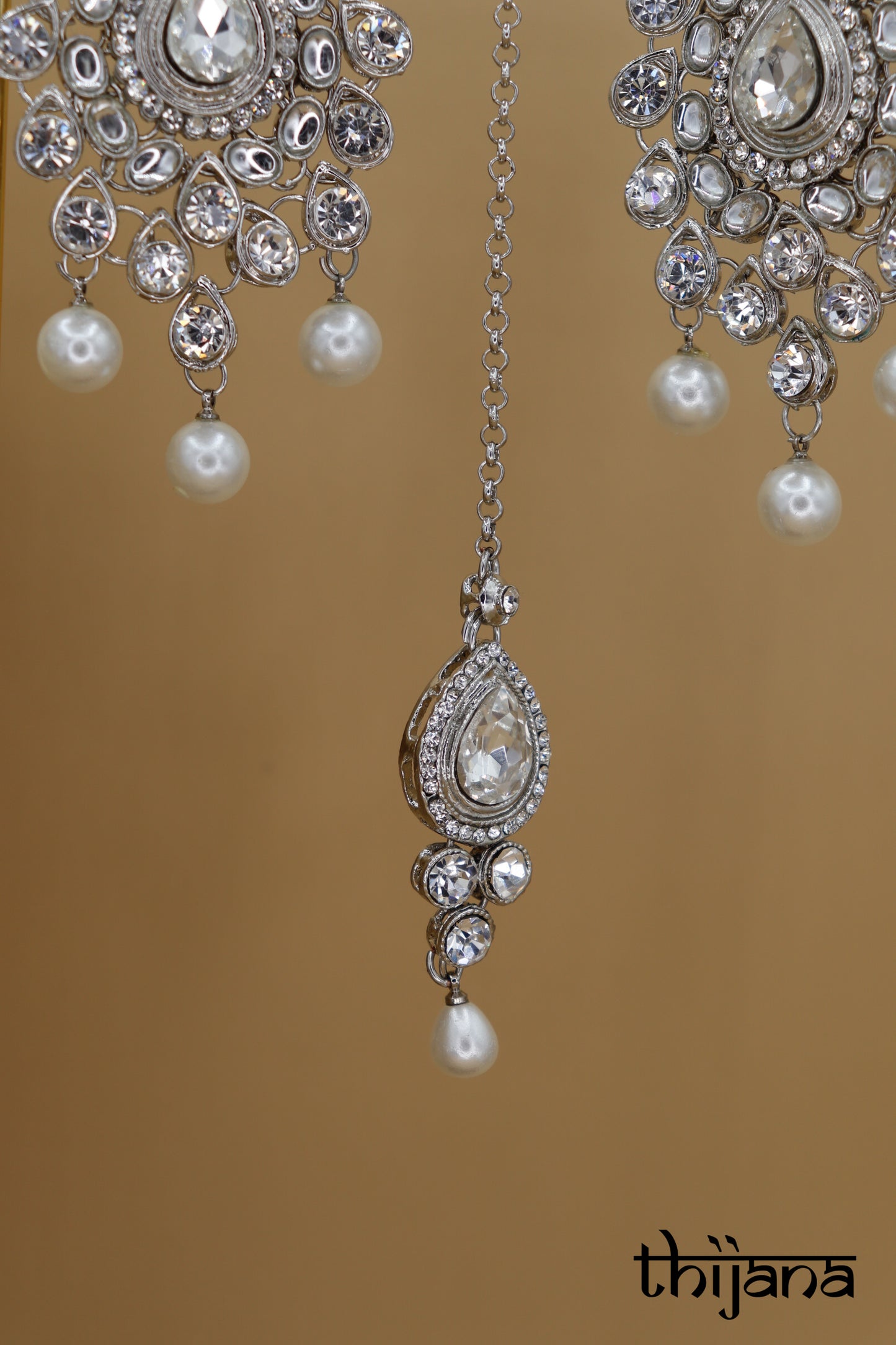 Necklace with matching earrings and tikka