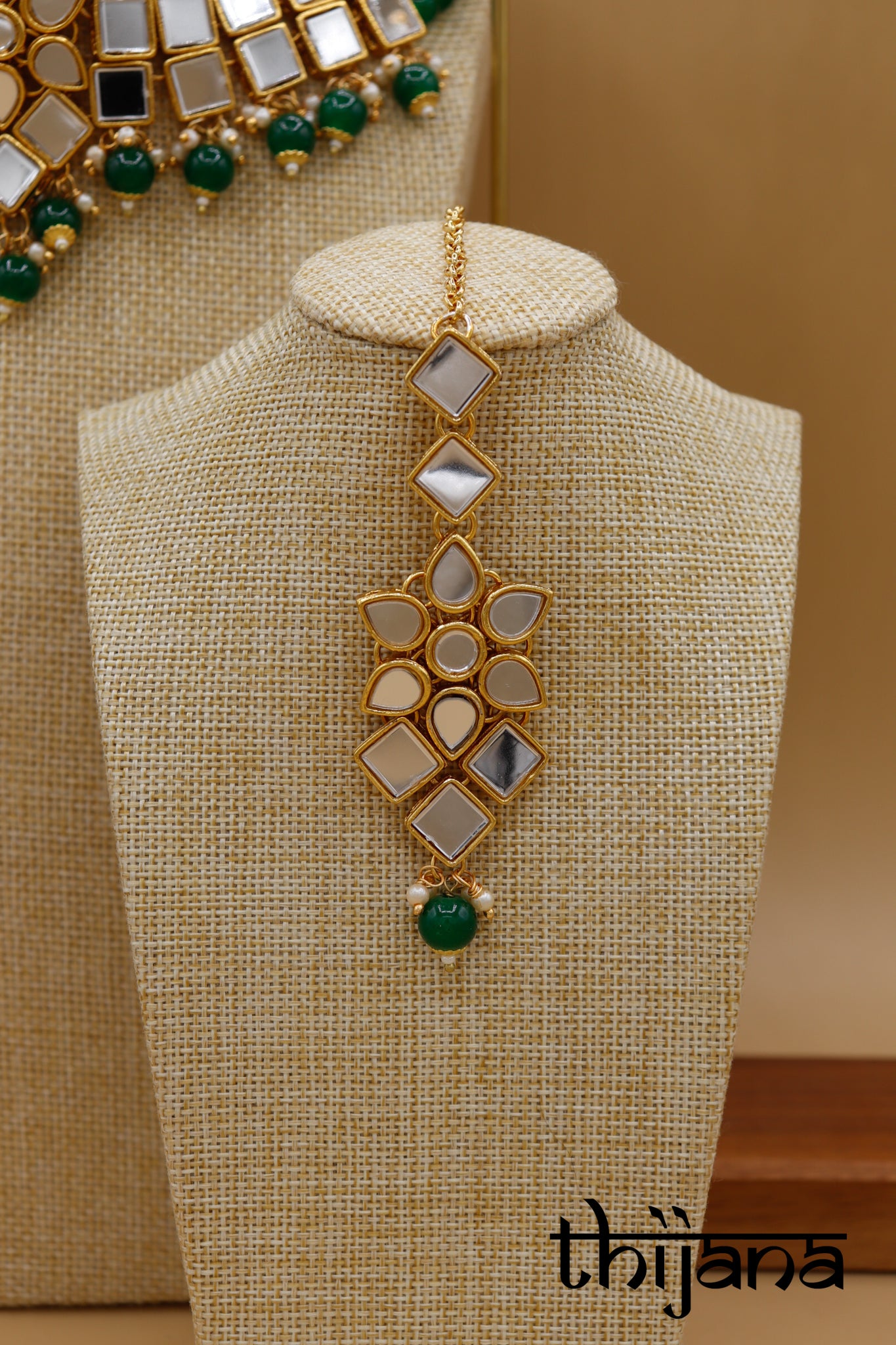 Necklace with matching earrings and tikka