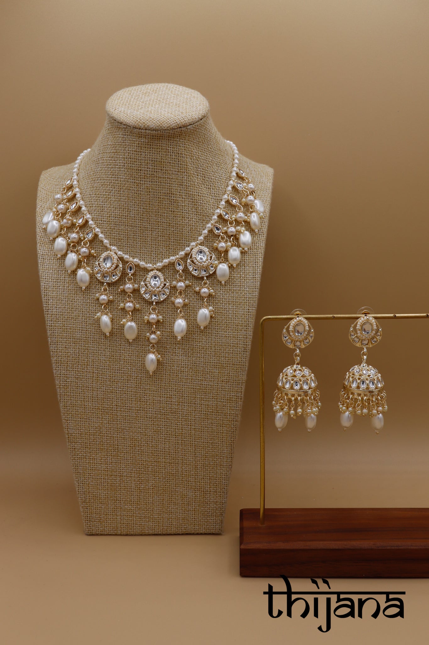 Necklace with matching earrings and tikka