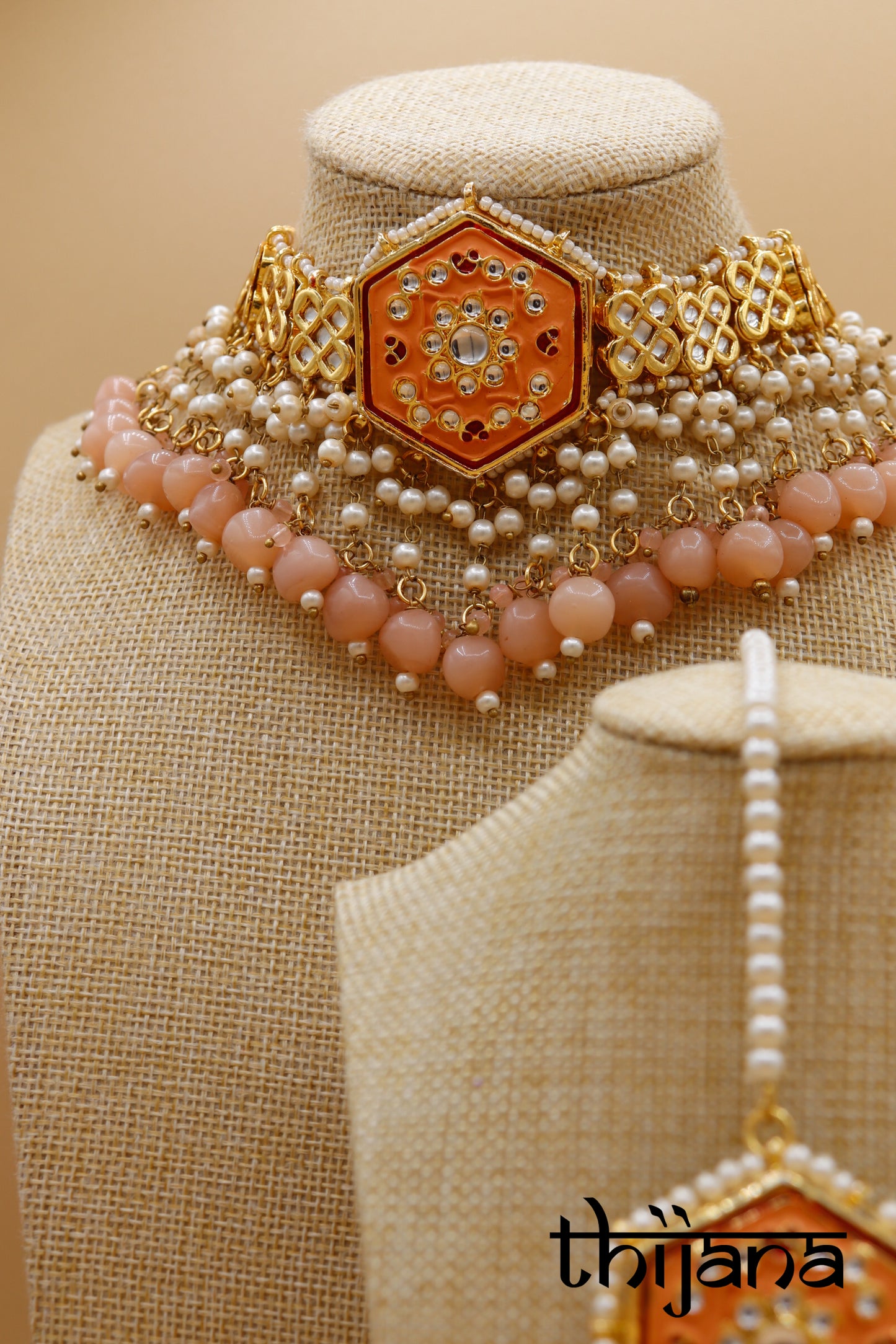 Necklace with matching earrings and tikka