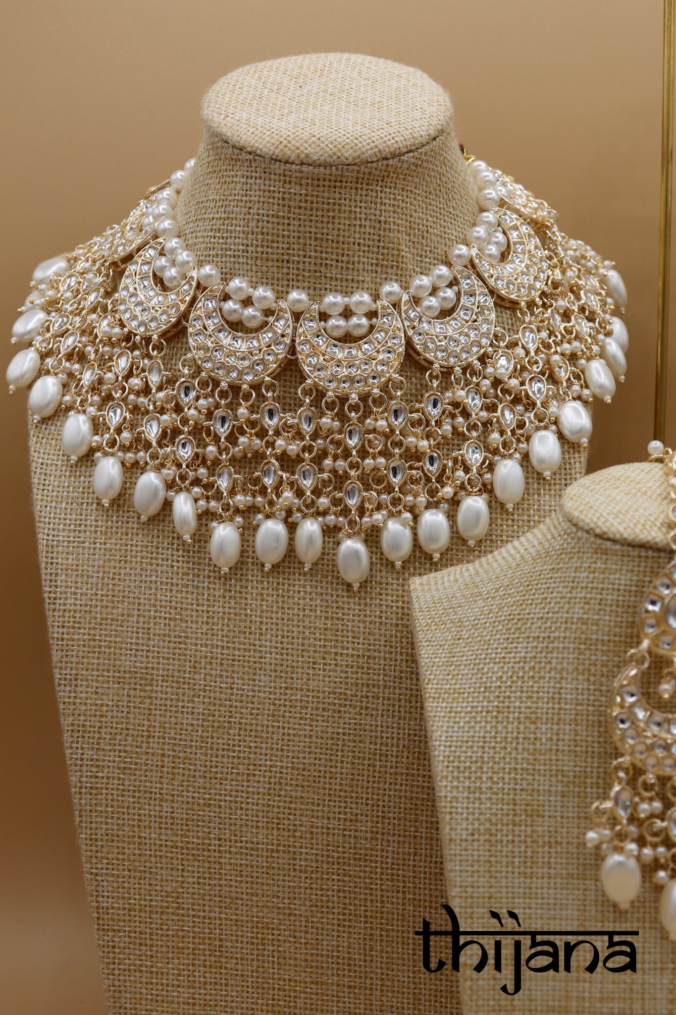Necklace with matching earrings and tikka