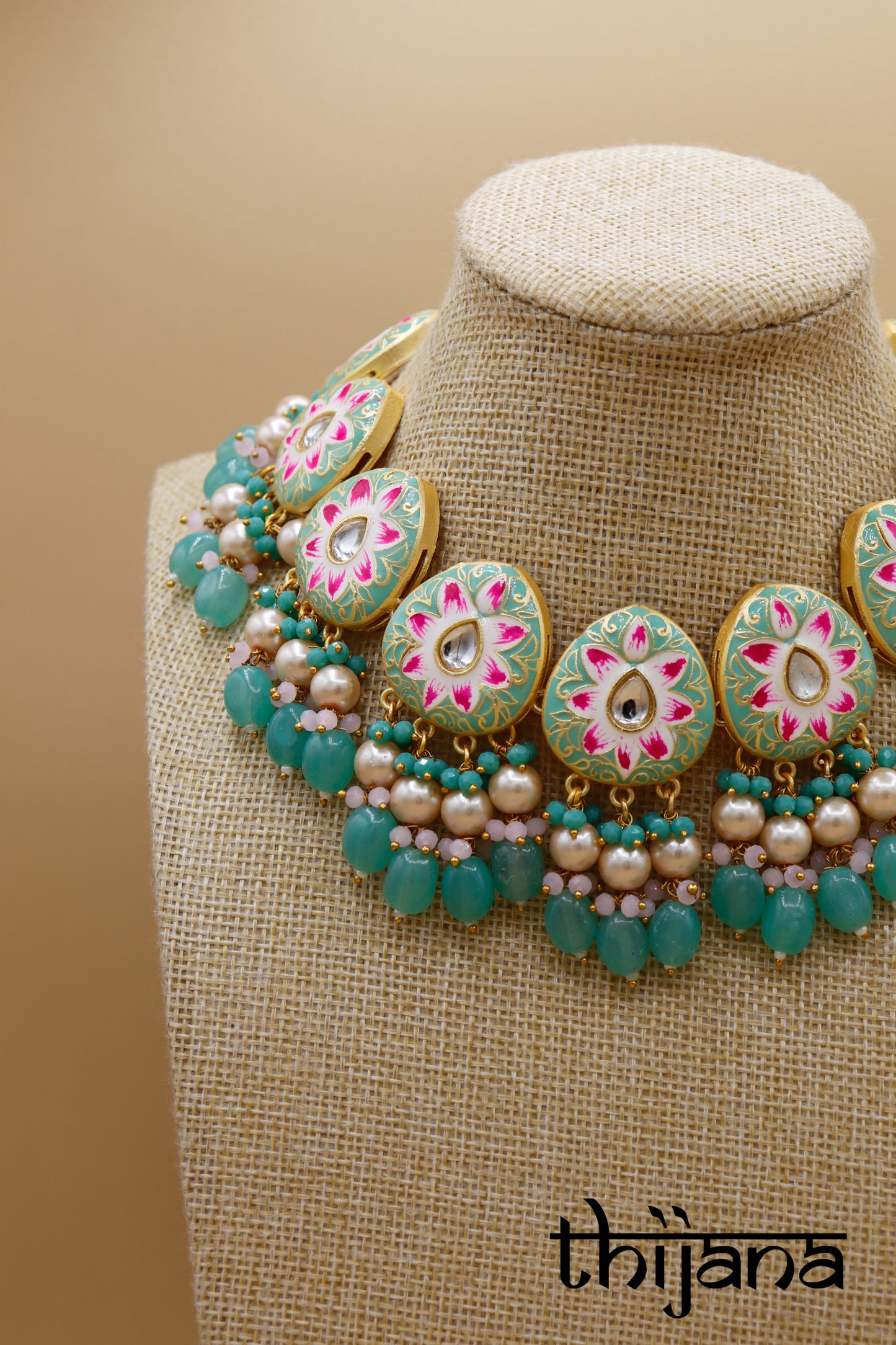 Kundan necklace with matching earrings and tikka