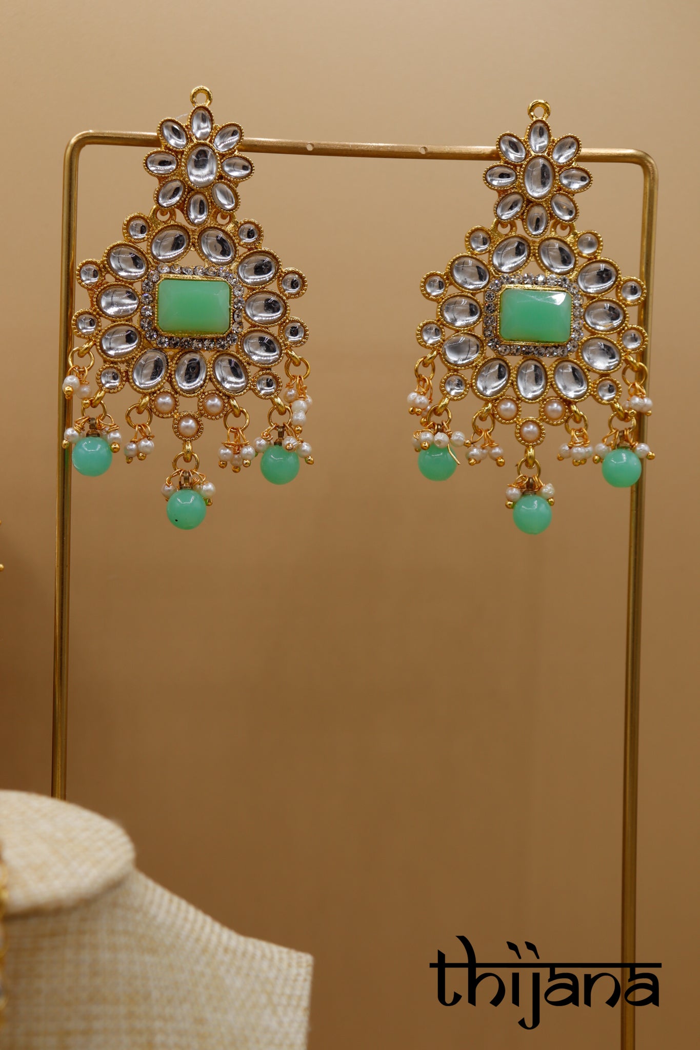 Necklace with matching earrings and tikka