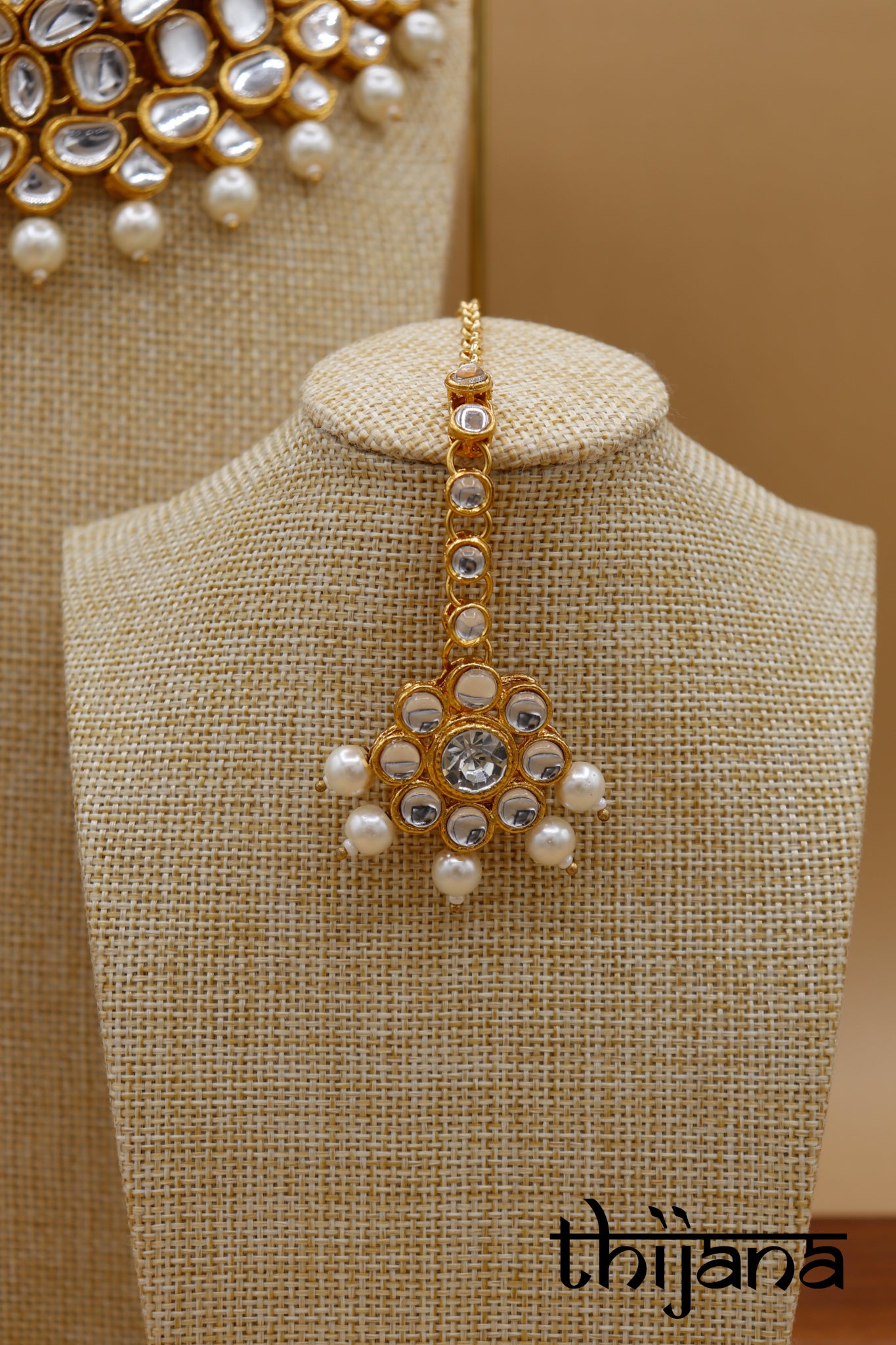 Necklace with matching earrings and tikka