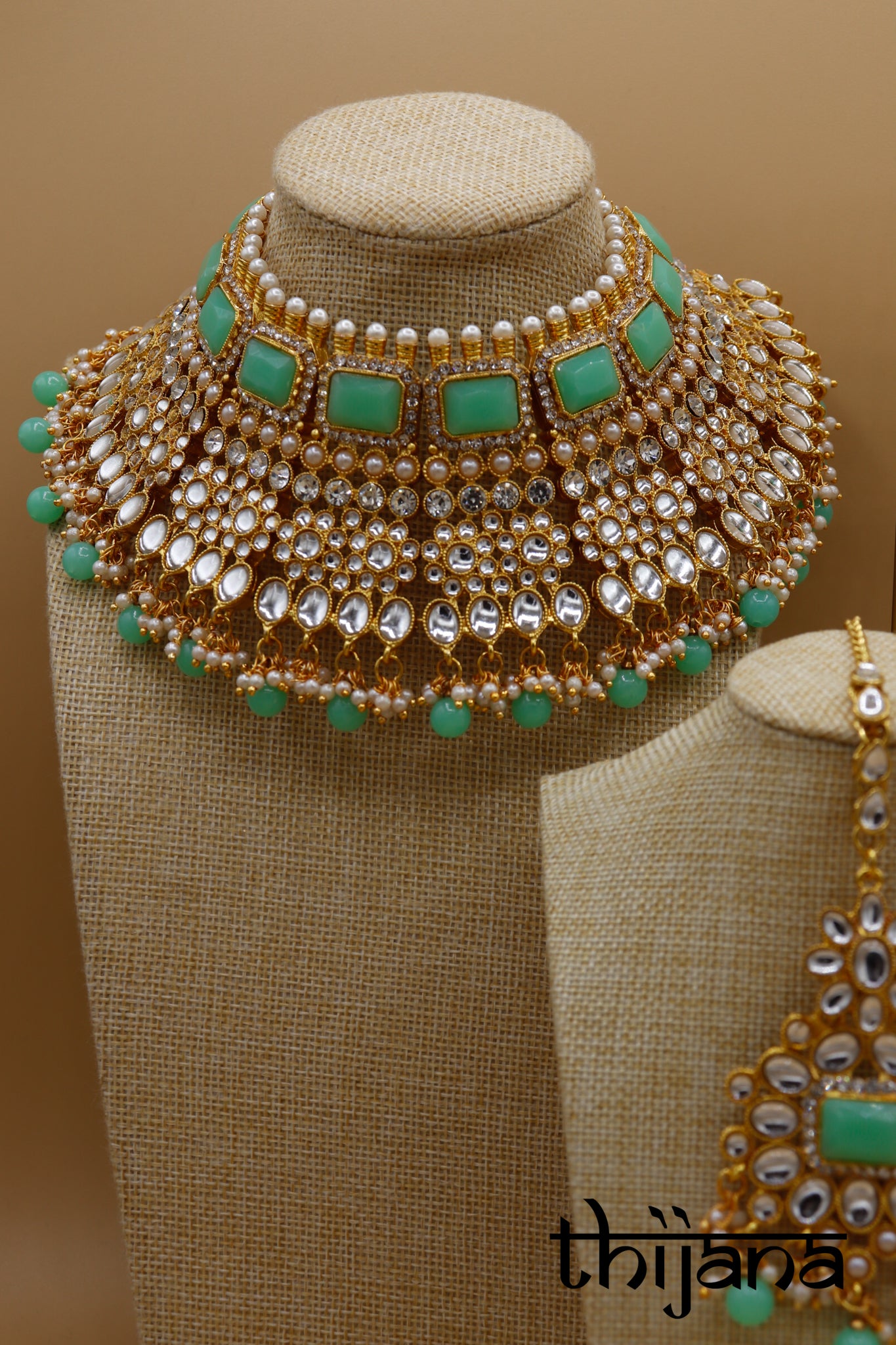Necklace with matching earrings and tikka