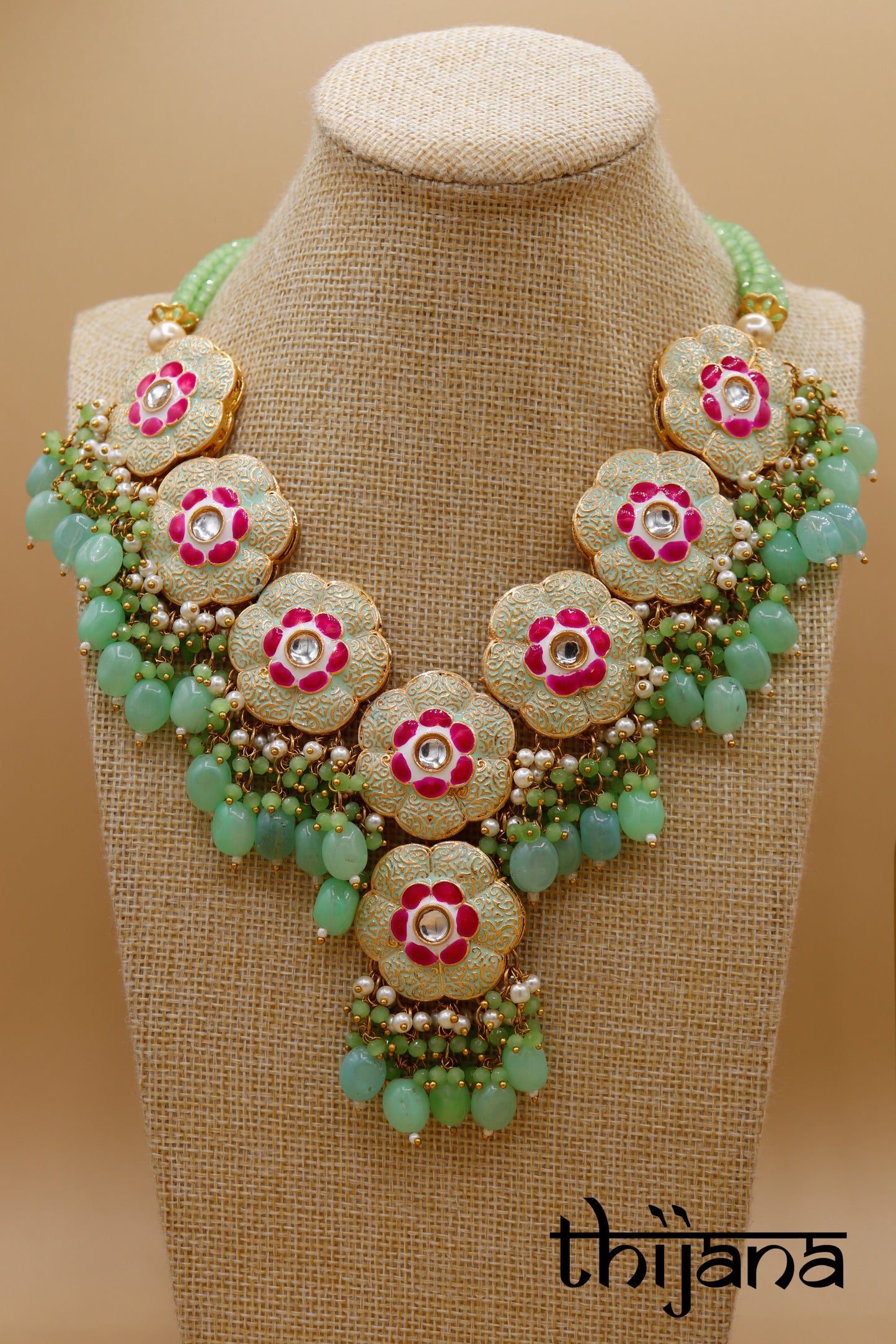Necklace with matching earrings and tikka