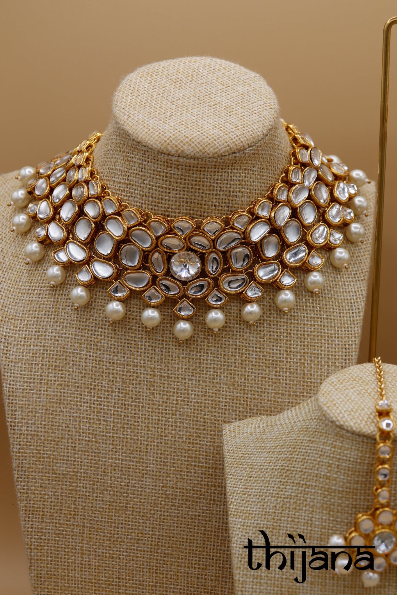 Necklace with matching earrings and tikka