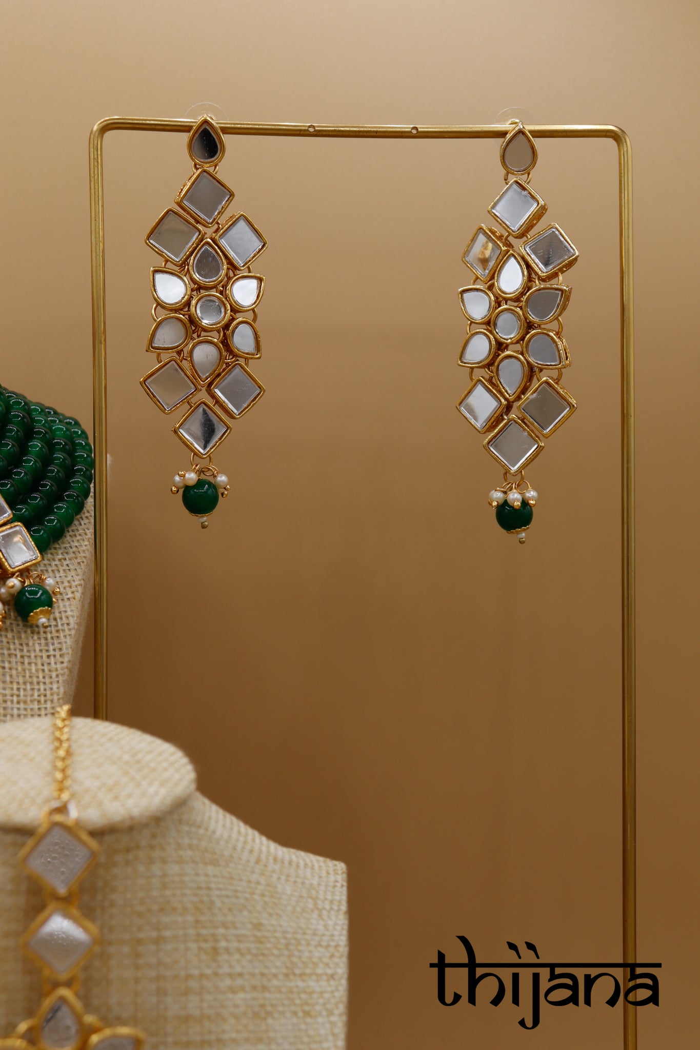 Necklace with matching earrings and tikka