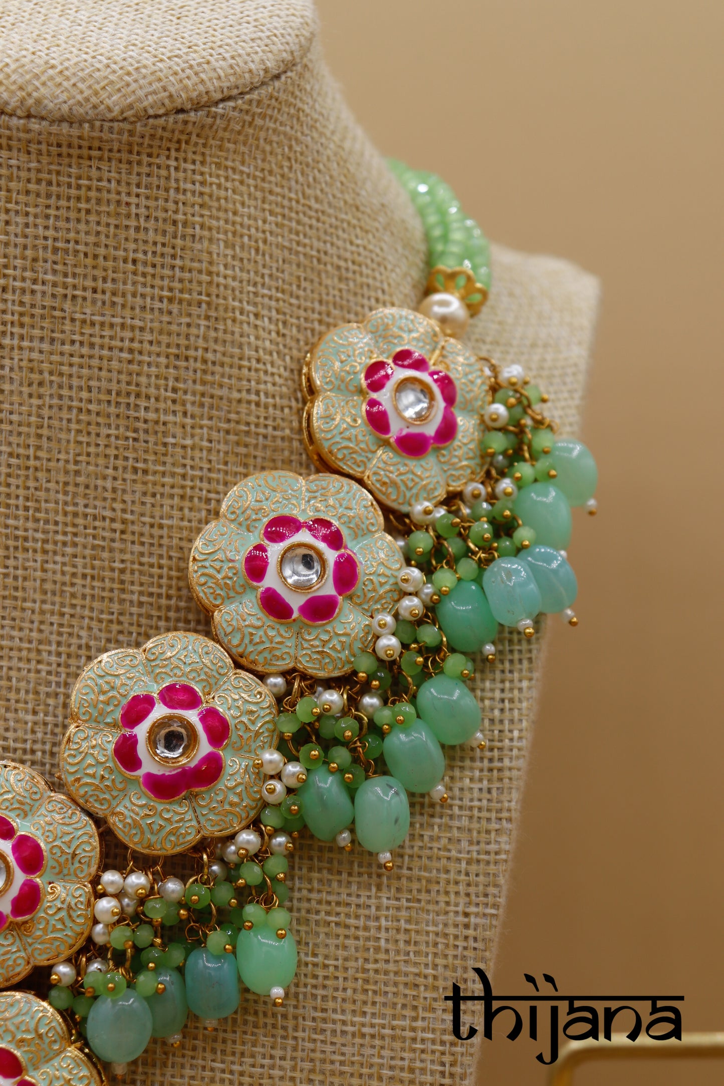 Necklace with matching earrings and tikka