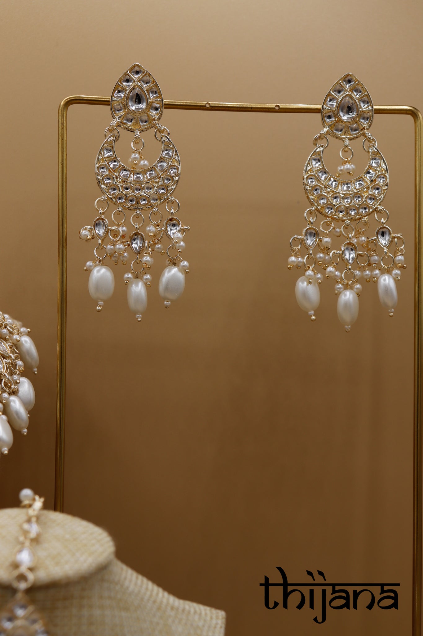 Necklace with matching earrings and tikka
