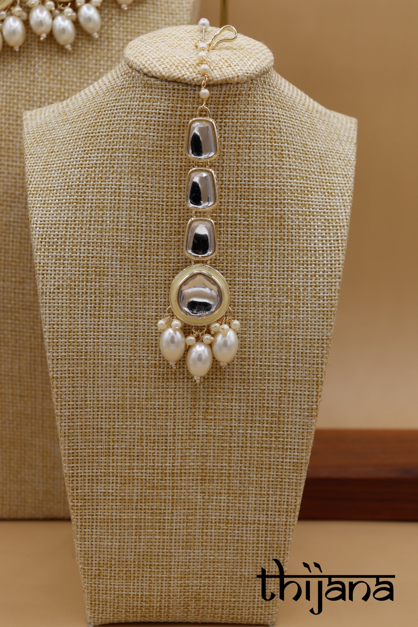 Necklace with matching earrings and tikka