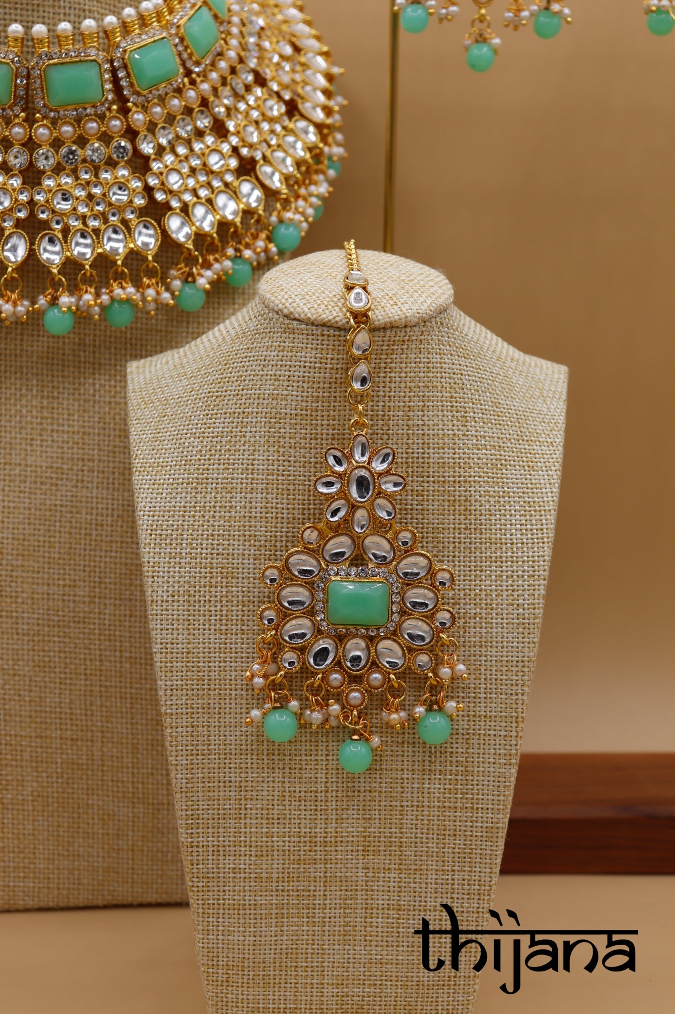 Necklace with matching earrings and tikka