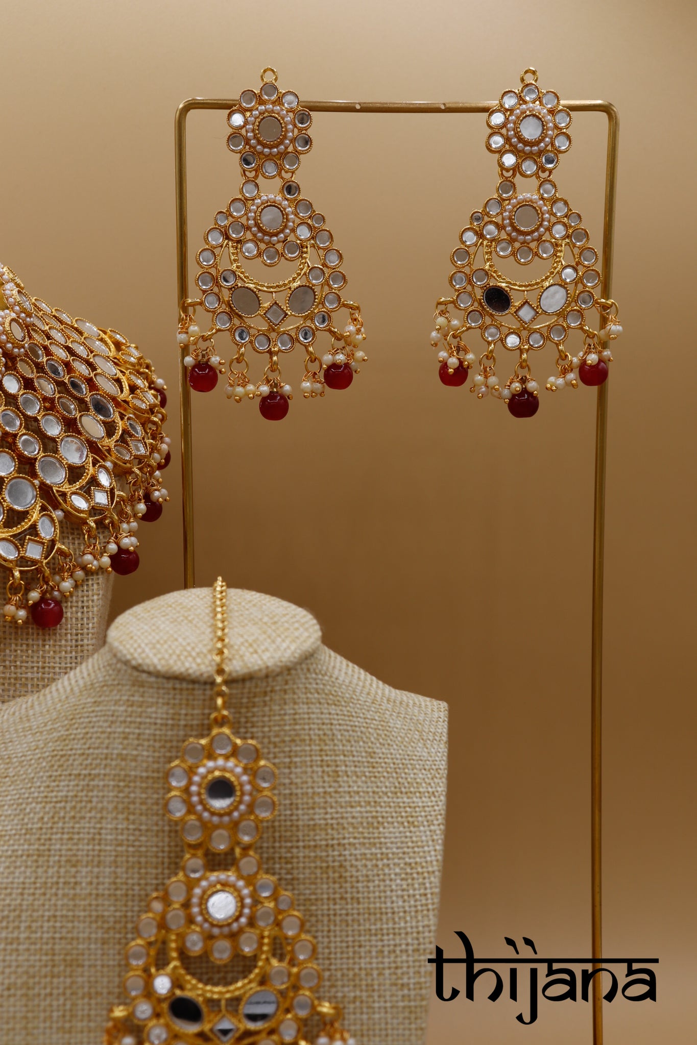 Necklace with matching earrings and tikka