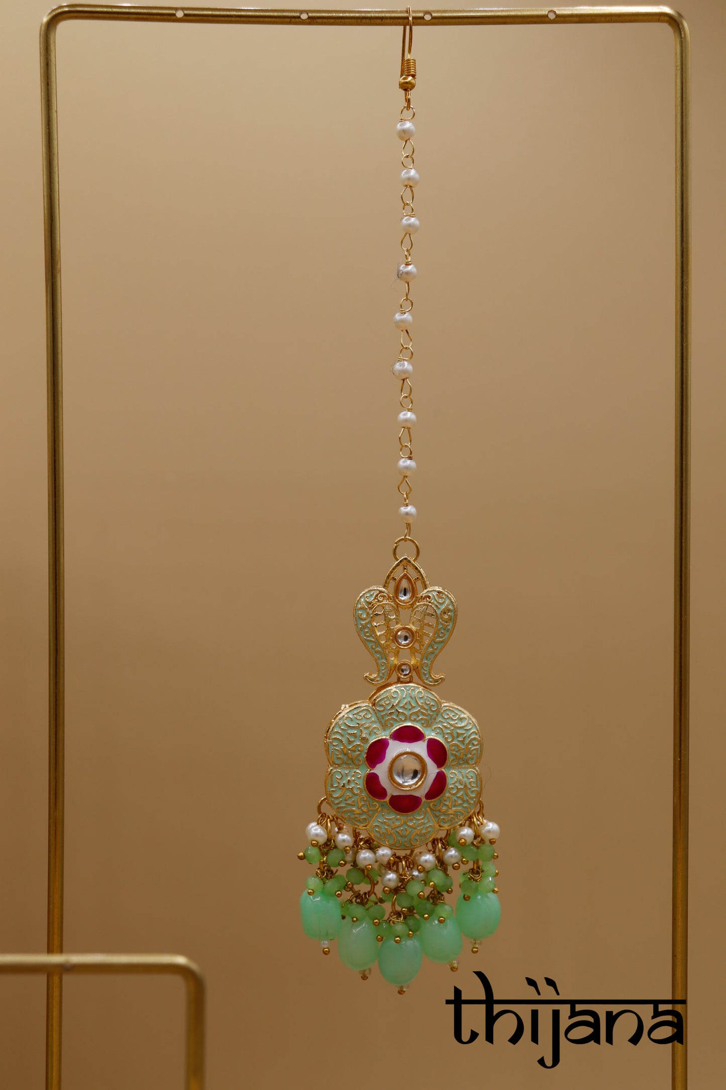 Necklace with matching earrings and tikka