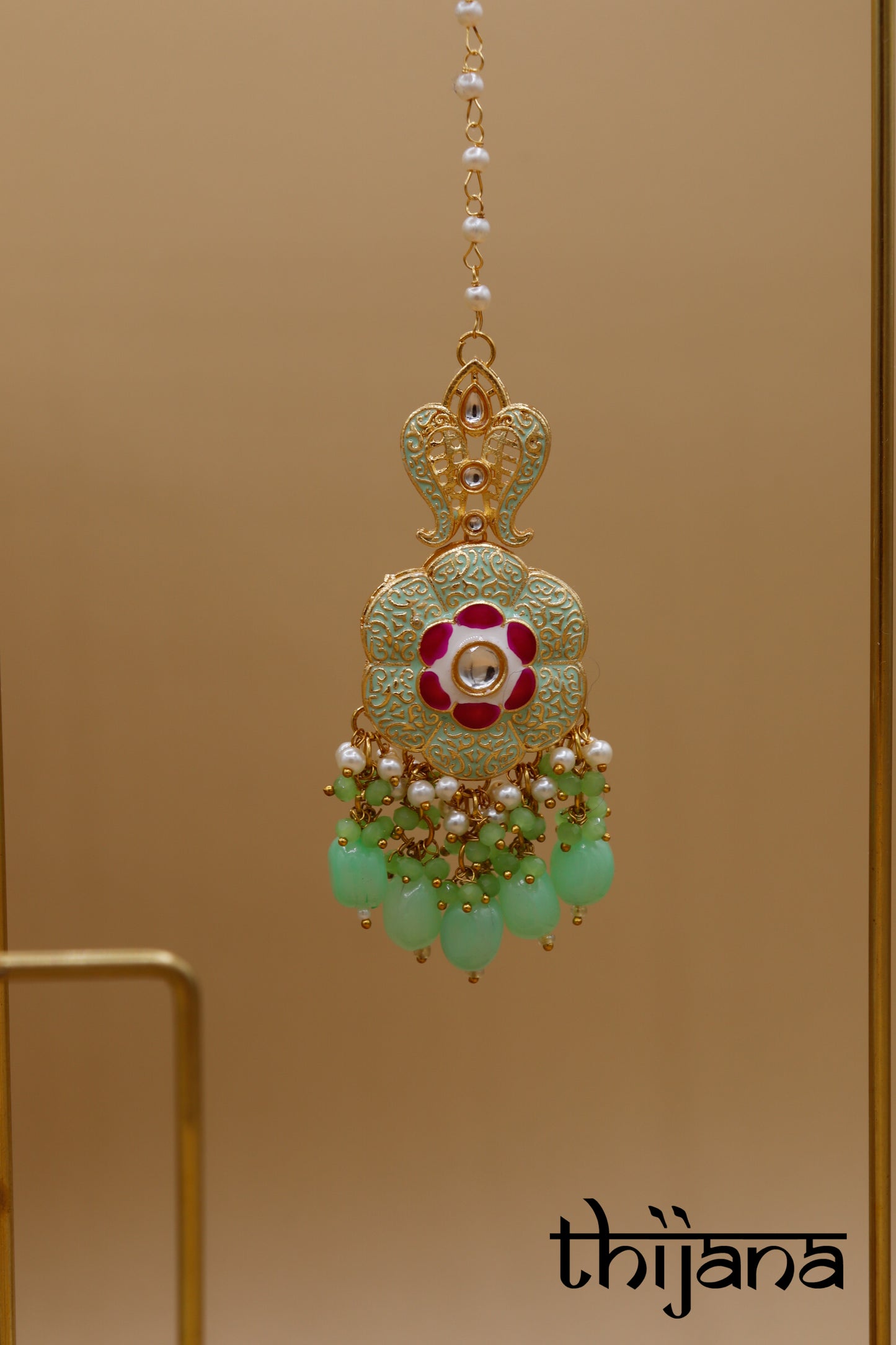Necklace with matching earrings and tikka