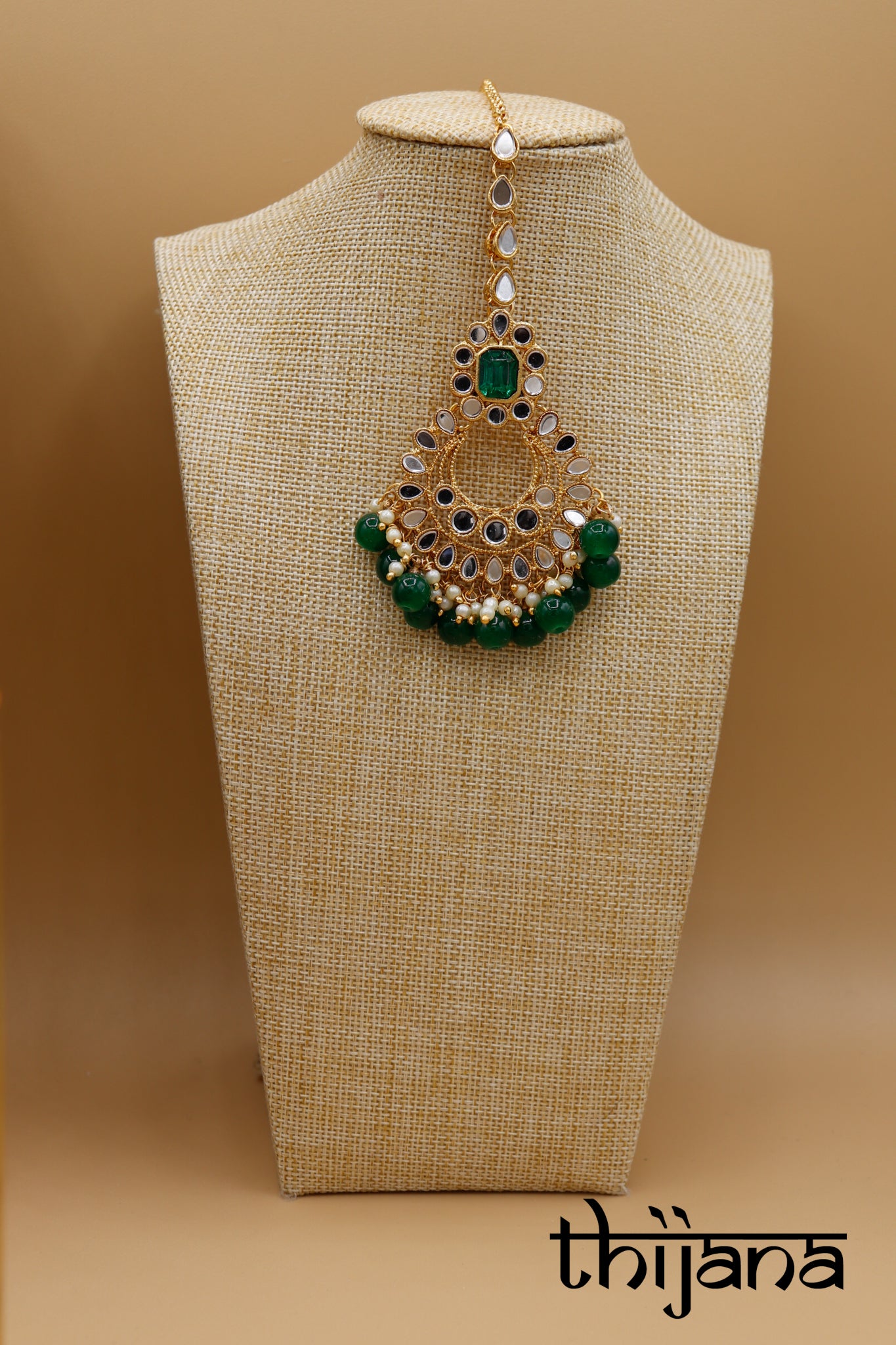 Necklace with matching earrings and tikka