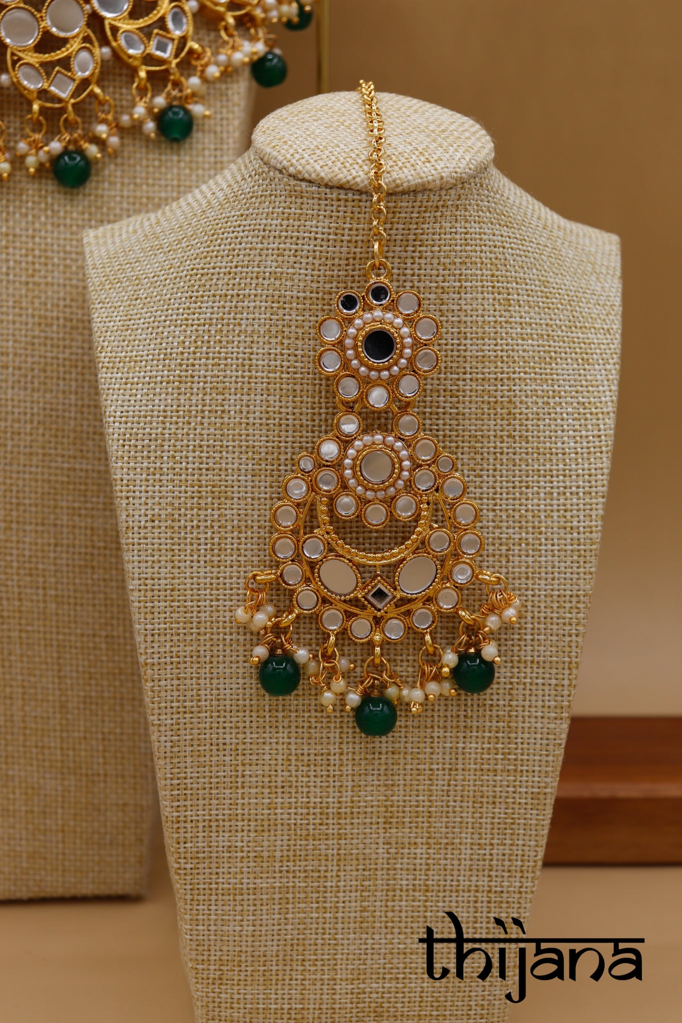 Necklace with matching earrings and tikka