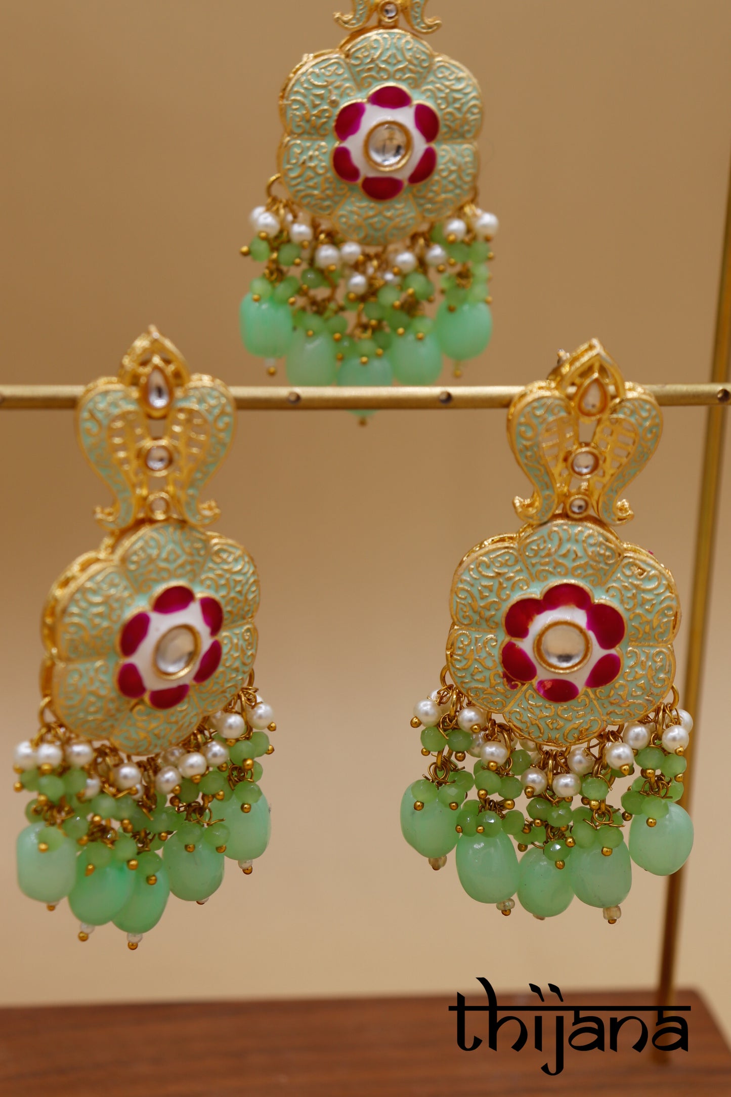 Necklace with matching earrings and tikka