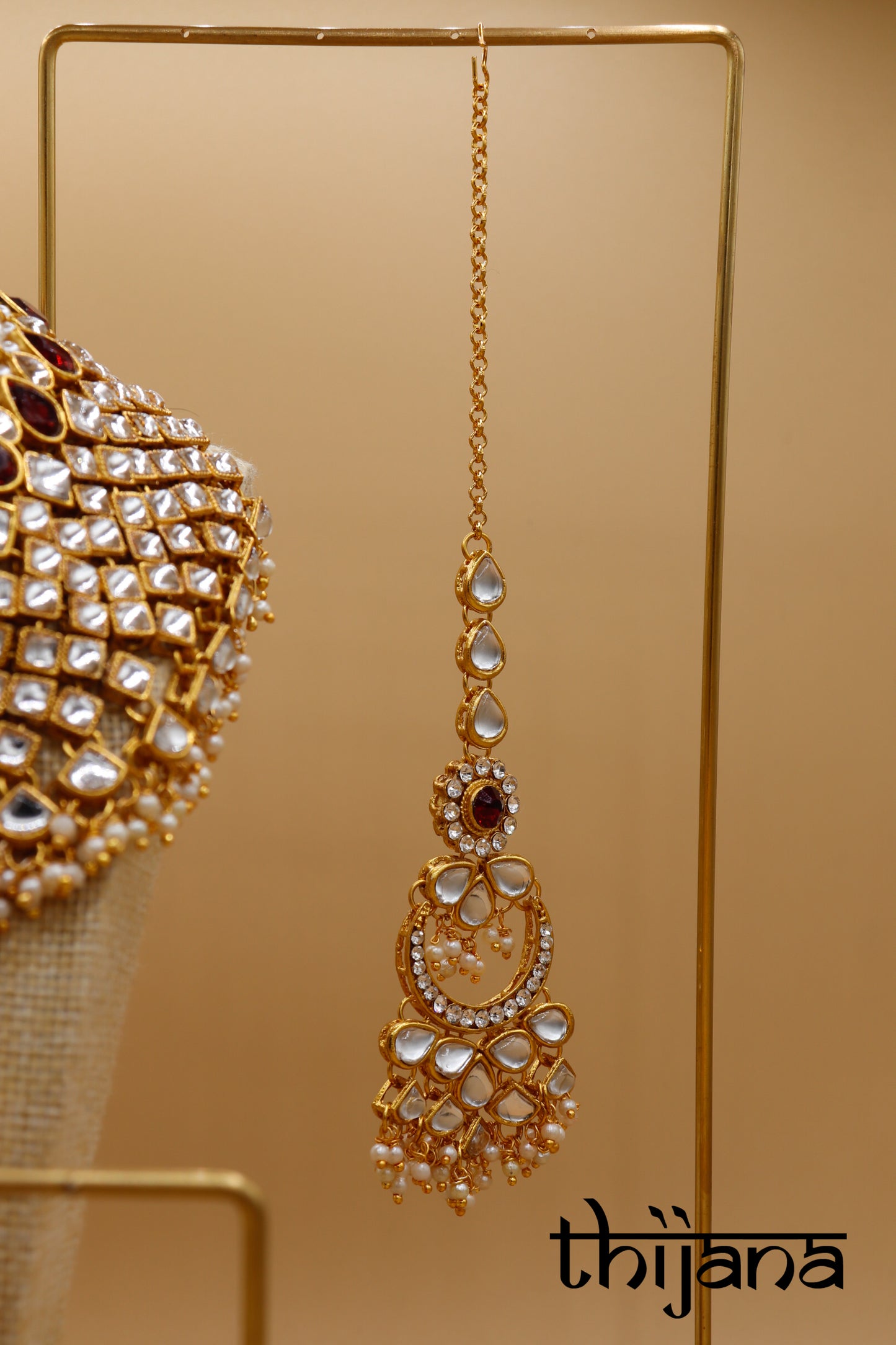 Necklace with matching earrings and tikka