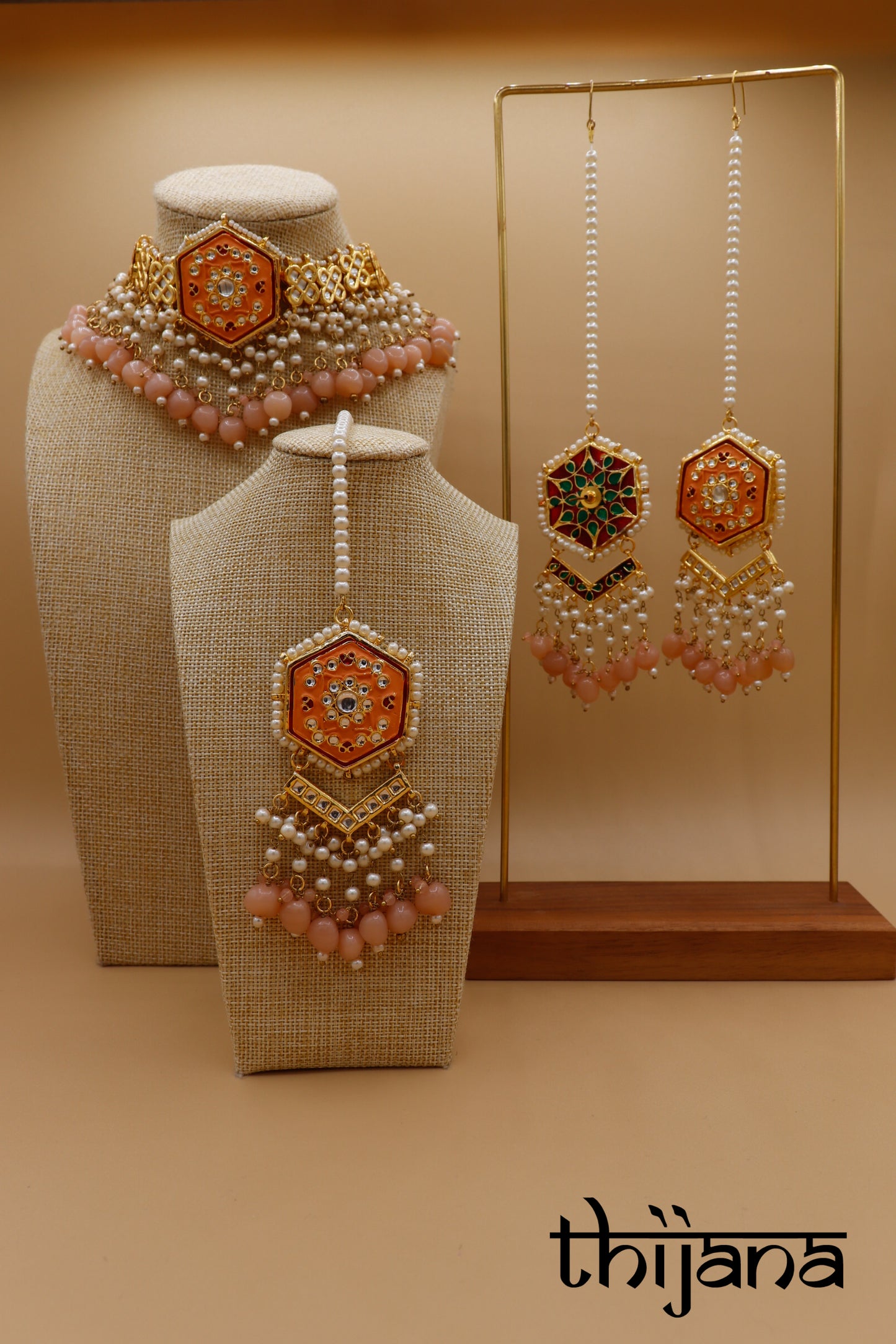 Necklace with matching earrings and tikka