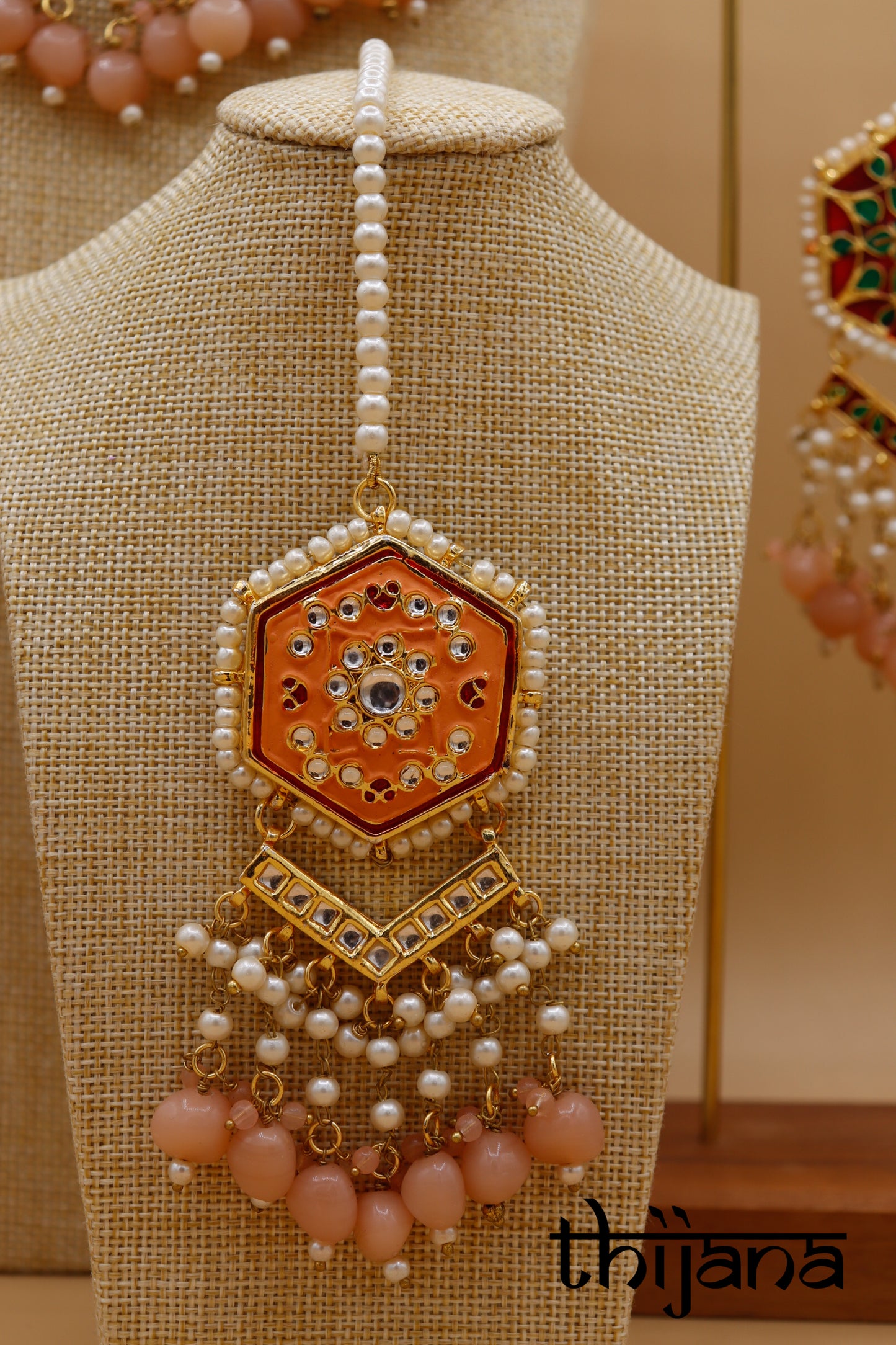 Necklace with matching earrings and tikka