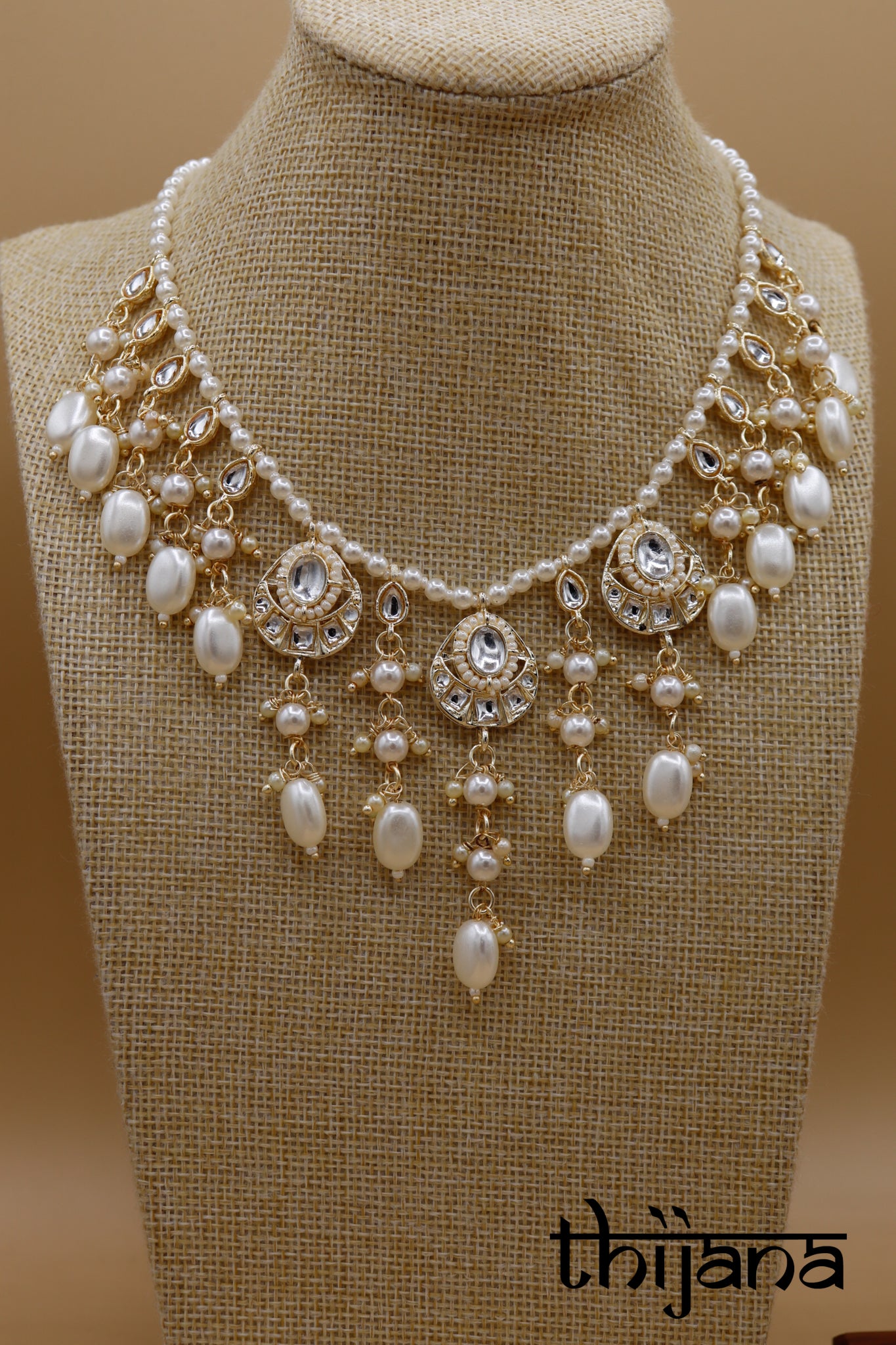 Necklace with matching earrings and tikka