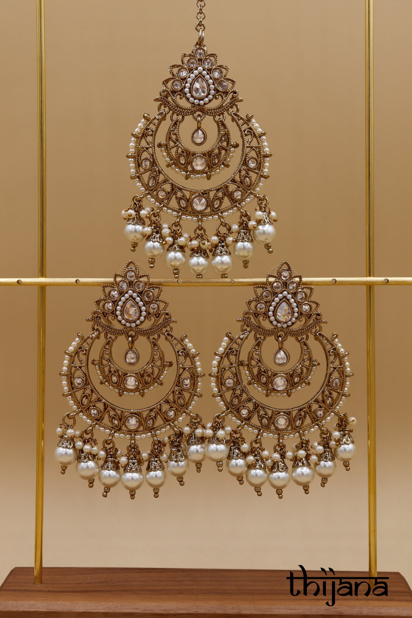 Earrings with matching tikka