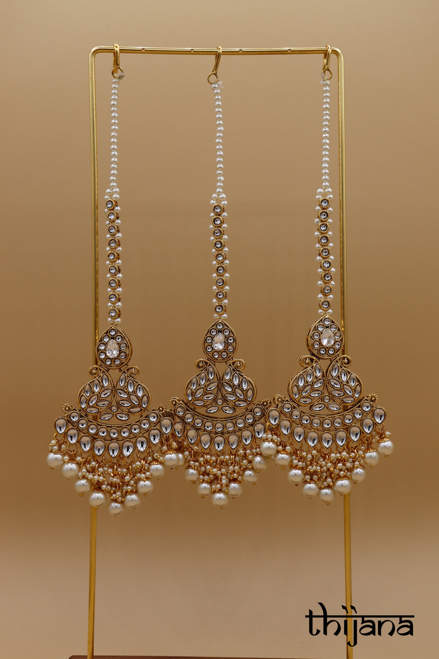 Earrings with matching tikka