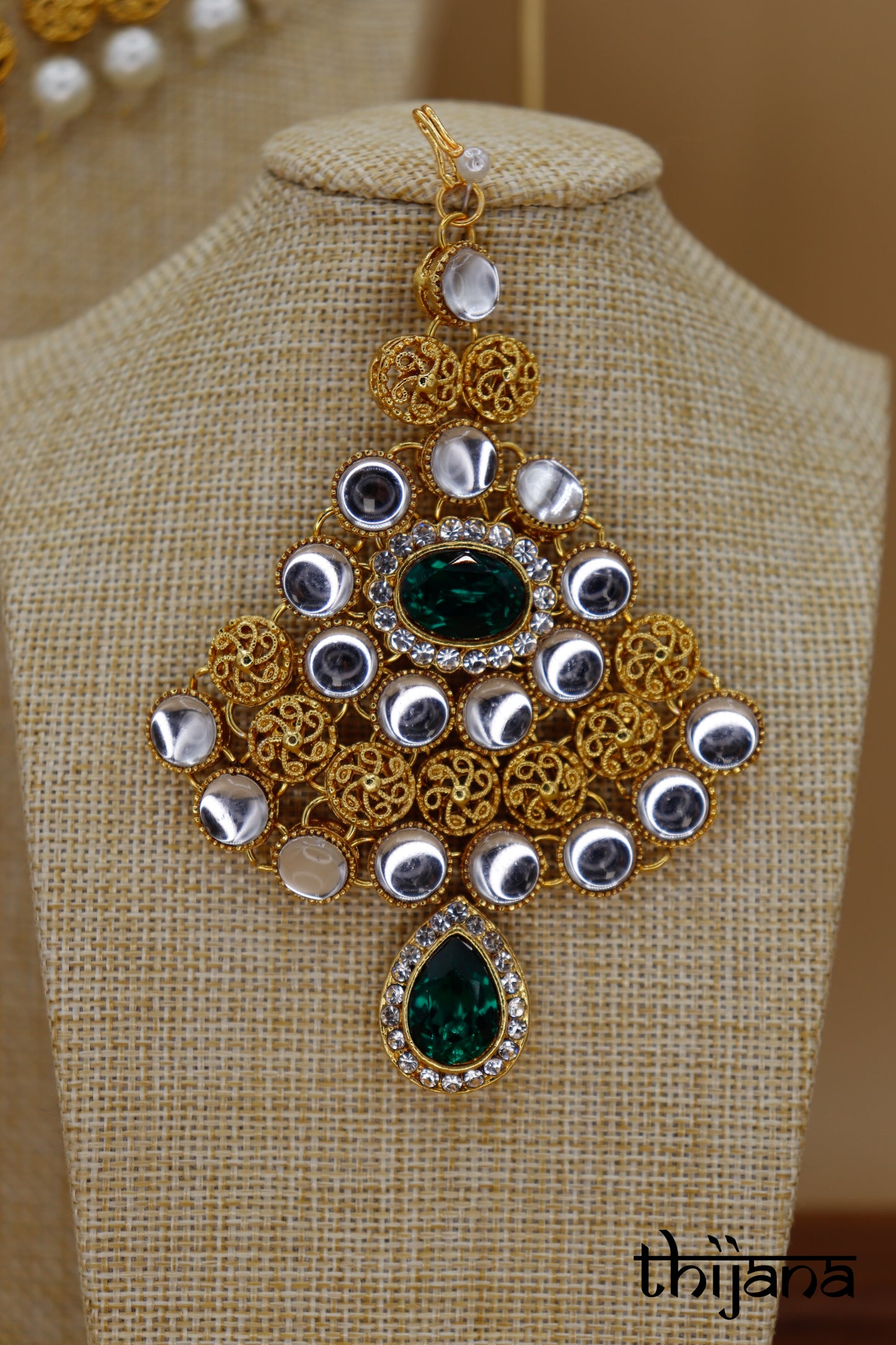Necklace with matching earrings, maang tikka and pang tikka