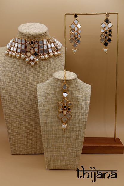 Necklace with matching earrings and tikka