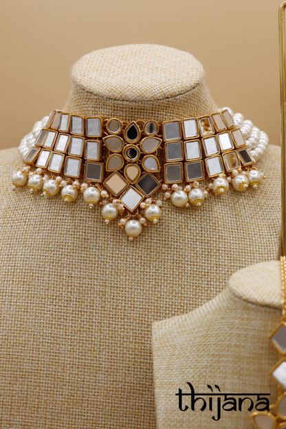 Necklace with matching earrings and tikka