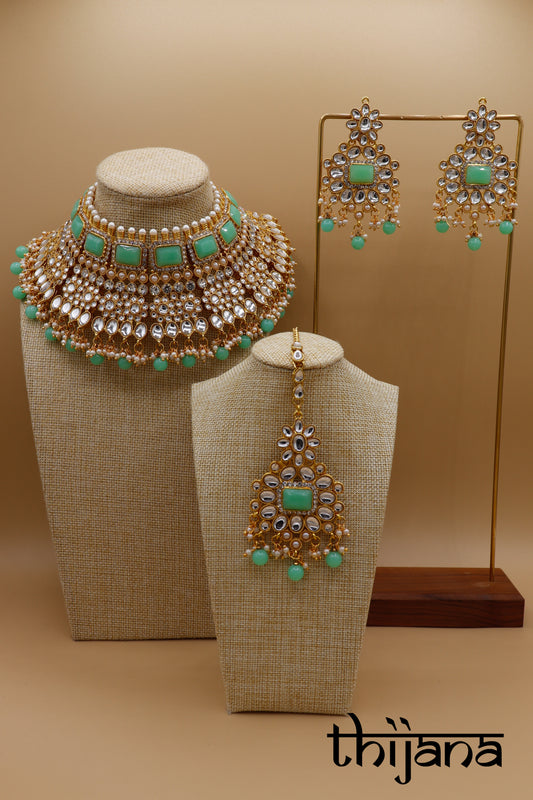 Necklace with matching earrings and tikka