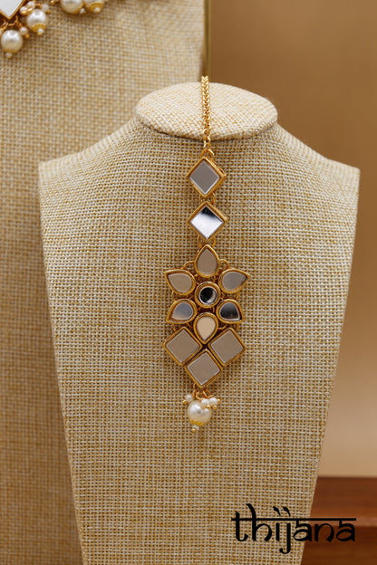 Necklace with matching earrings and tikka